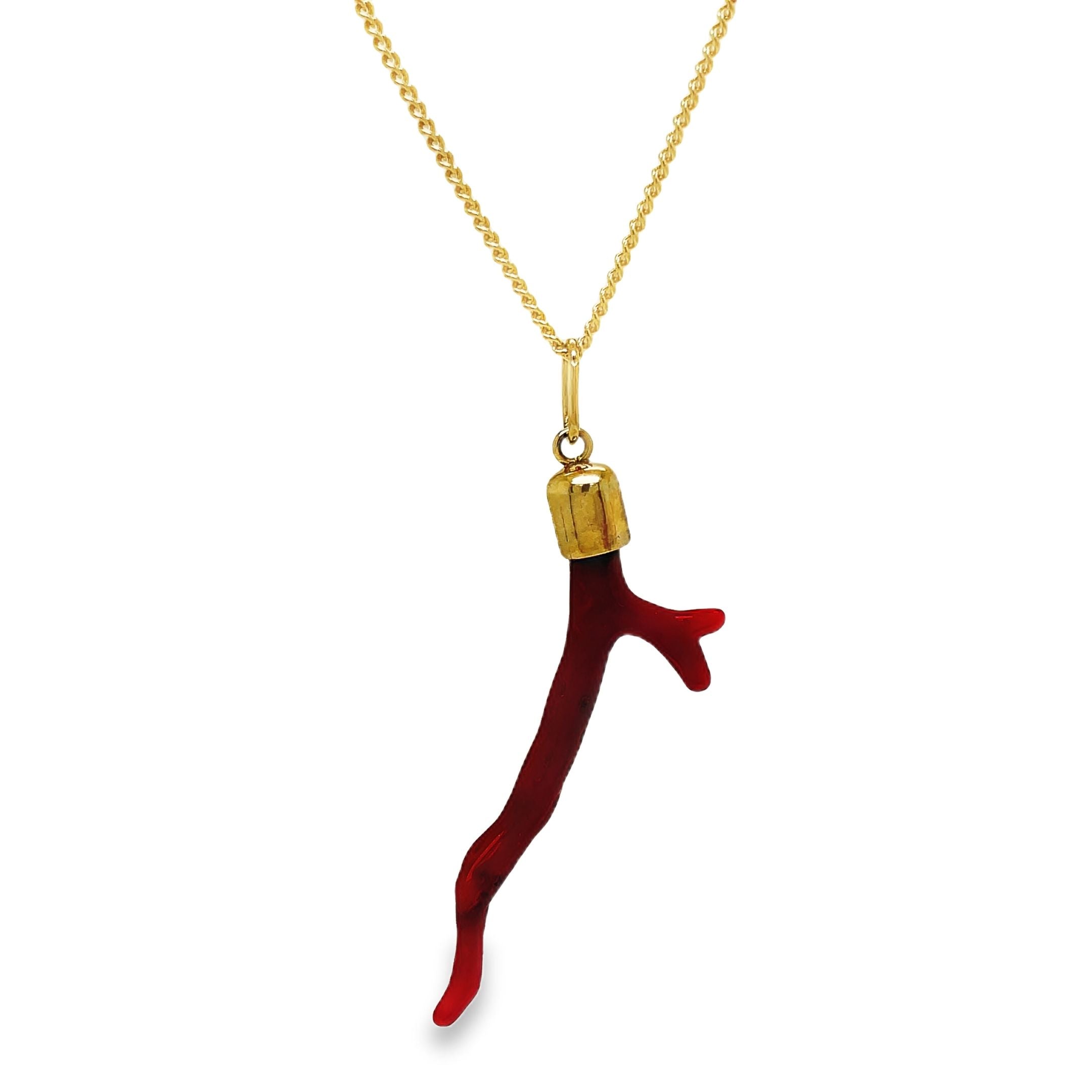 Add a touch of luxury to any outfit with our handmade 18k yellow gold cap pendant necklace featuring a natural red coral branch. This exclusive necklace evokes the beauty of the ocean and embodies the sophistication of our brand. Elevate your style with this elegant and timeless piece.

Chain sold separately $599.00 rolo chain