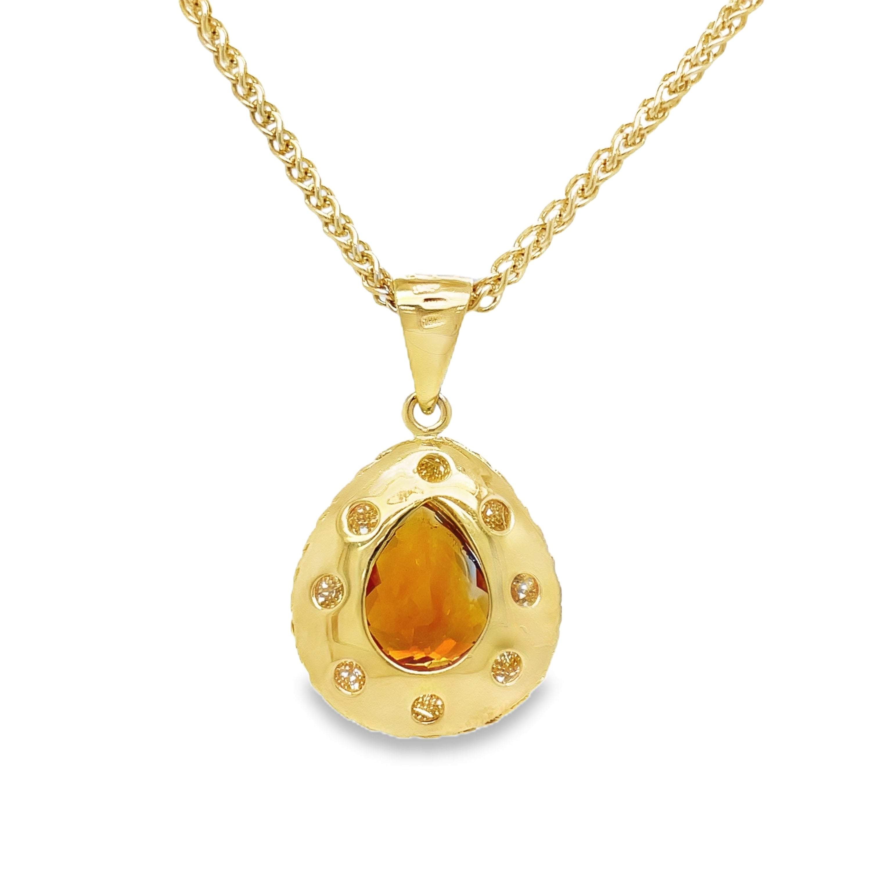 levate your style with our Italian Made Trillion Citrine Pendant Necklace. Crafted with 18k yellow gold in a stunning matte finish, this necklace showcases a woven style and a mesmerizing pear shape Madeira citrine. Handcrafted in Italy with attention to detail, it exudes luxury and sophistication.

30.00 mm size&nbsp;

Chain not included ($700)