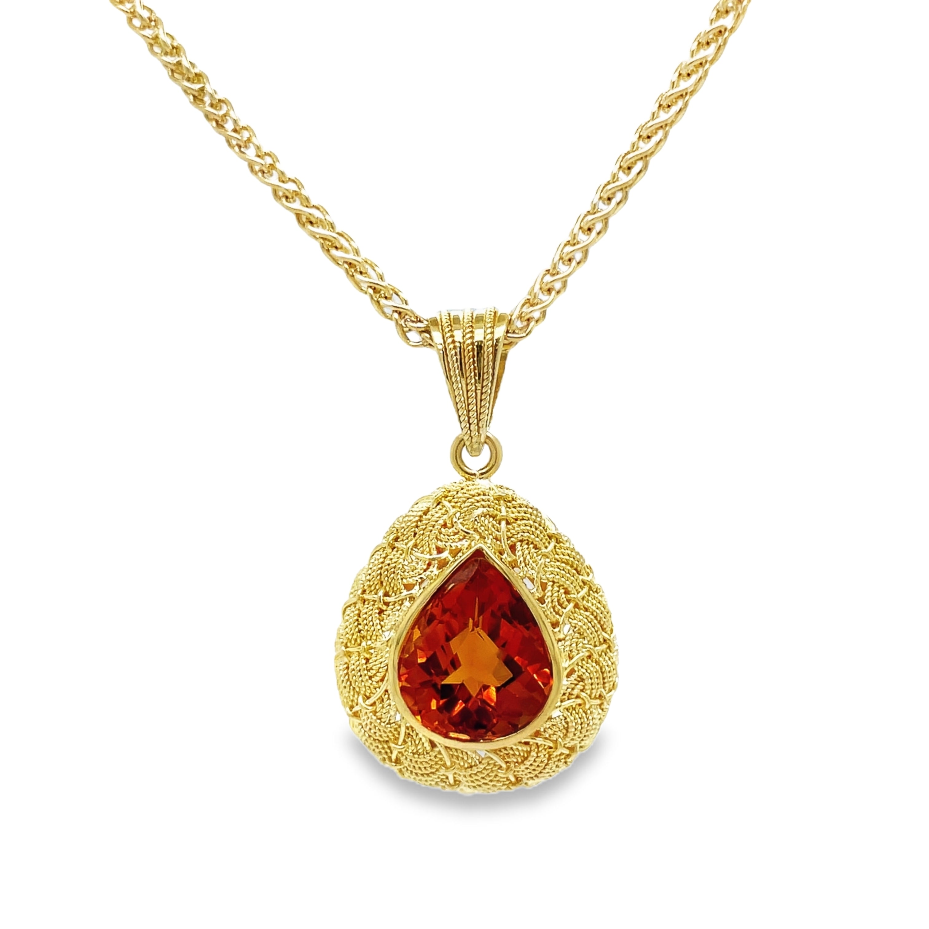 levate your style with our Italian Made Trillion Citrine Pendant Necklace. Crafted with 18k yellow gold in a stunning matte finish, this necklace showcases a woven style and a mesmerizing pear shape Madeira citrine. Handcrafted in Italy with attention to detail, it exudes luxury and sophistication.

30.00 mm size&nbsp;

Chain not included ($700)