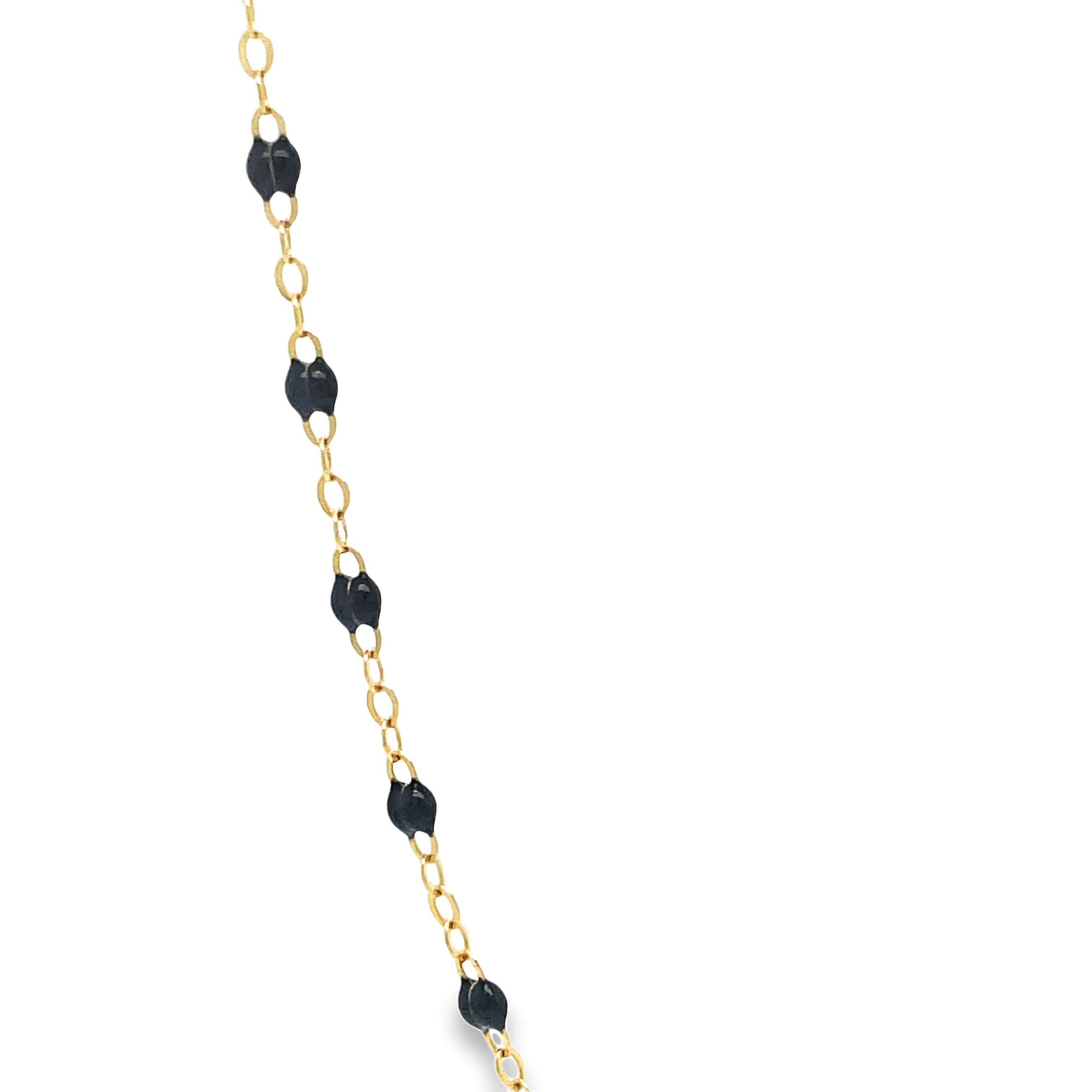 Expertly crafted with 18k yellow gold, this necklace boasts a sleek 20" length and features delicate, small enamel beads in a sophisticated gray hue. The addition of a convenient sizing loop ensures a perfect and comfortable fit. Enhance any outfit with this elegant and timeless piece of jewelry.