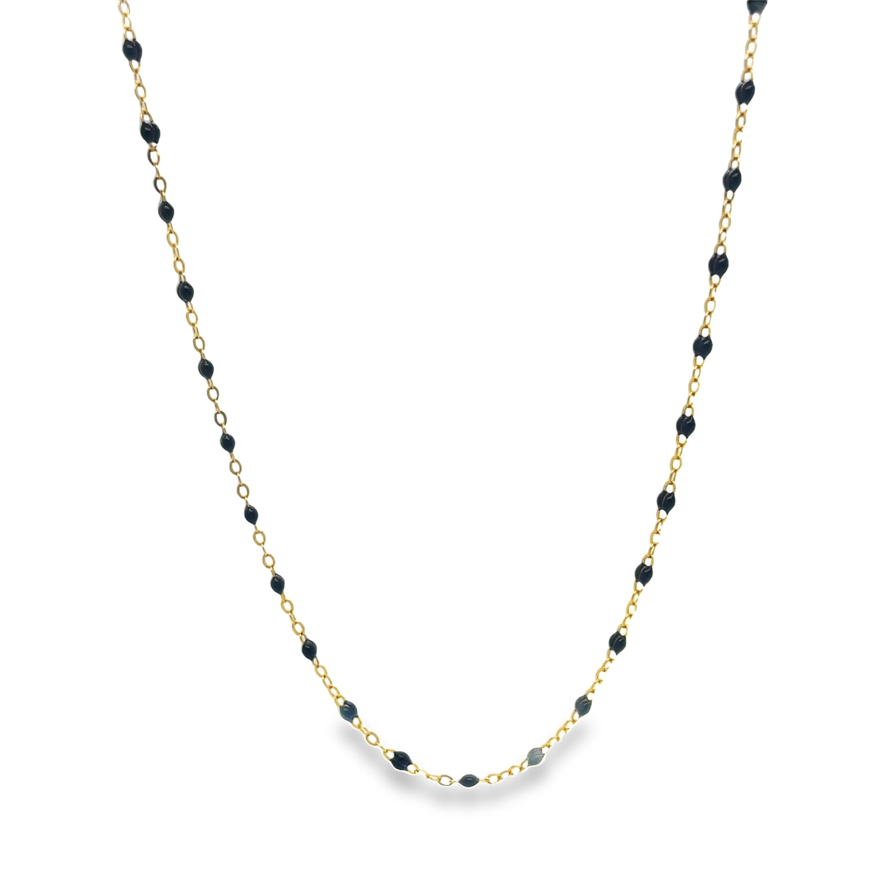 Expertly crafted with 18k yellow gold, this necklace boasts a sleek 20" length and features delicate, small enamel beads in a sophisticated gray hue. The addition of a convenient sizing loop ensures a perfect and comfortable fit. Enhance any outfit with this elegant and timeless piece of jewelry.