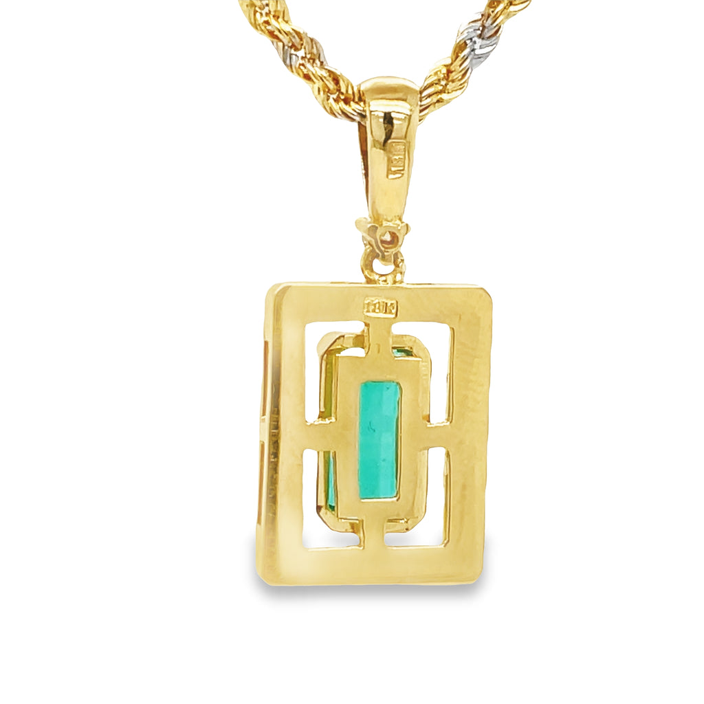 Make a luxurious statement with this exquisite Colombian Emerald & Diamond Pendant Necklace. Crafted with an emerald cut emerald of 1.44 cts, round diamonds, and bezel set in a rectangular handmade frame of 18k yellow gold and 18k two tone gold chain. This bold and breathtaking piece is perfect for adding a touch of glamour to any look!