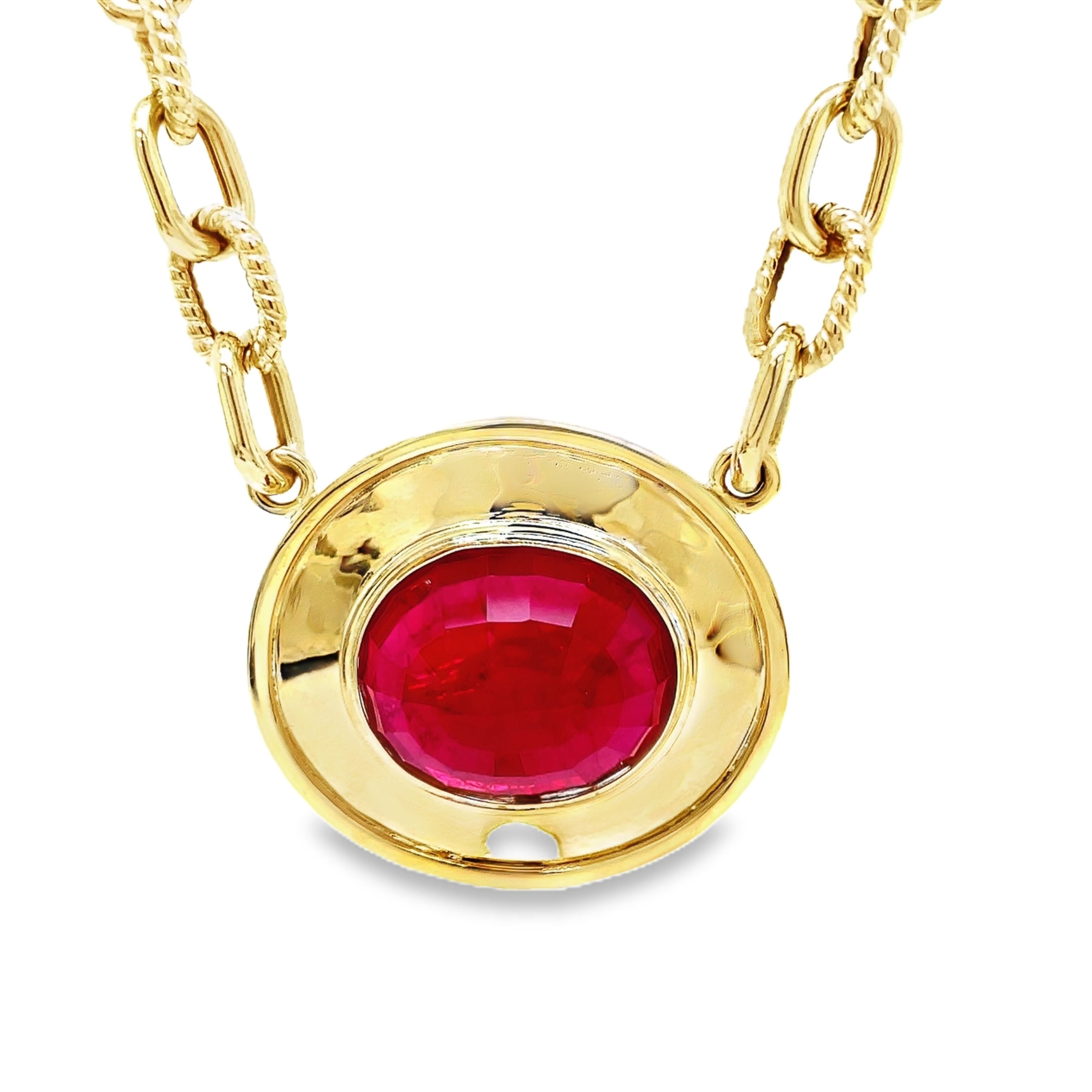 Elevate your look with our Large Oval Ruby Necklace, featuring a stunning 23.00 x 20.00 mm ruby set in a sturdy 14k yellow gold bezel. Handcrafted with care and Italian finesse, this necklace is secured by an elegant lobster catch and a 18" long open link chain