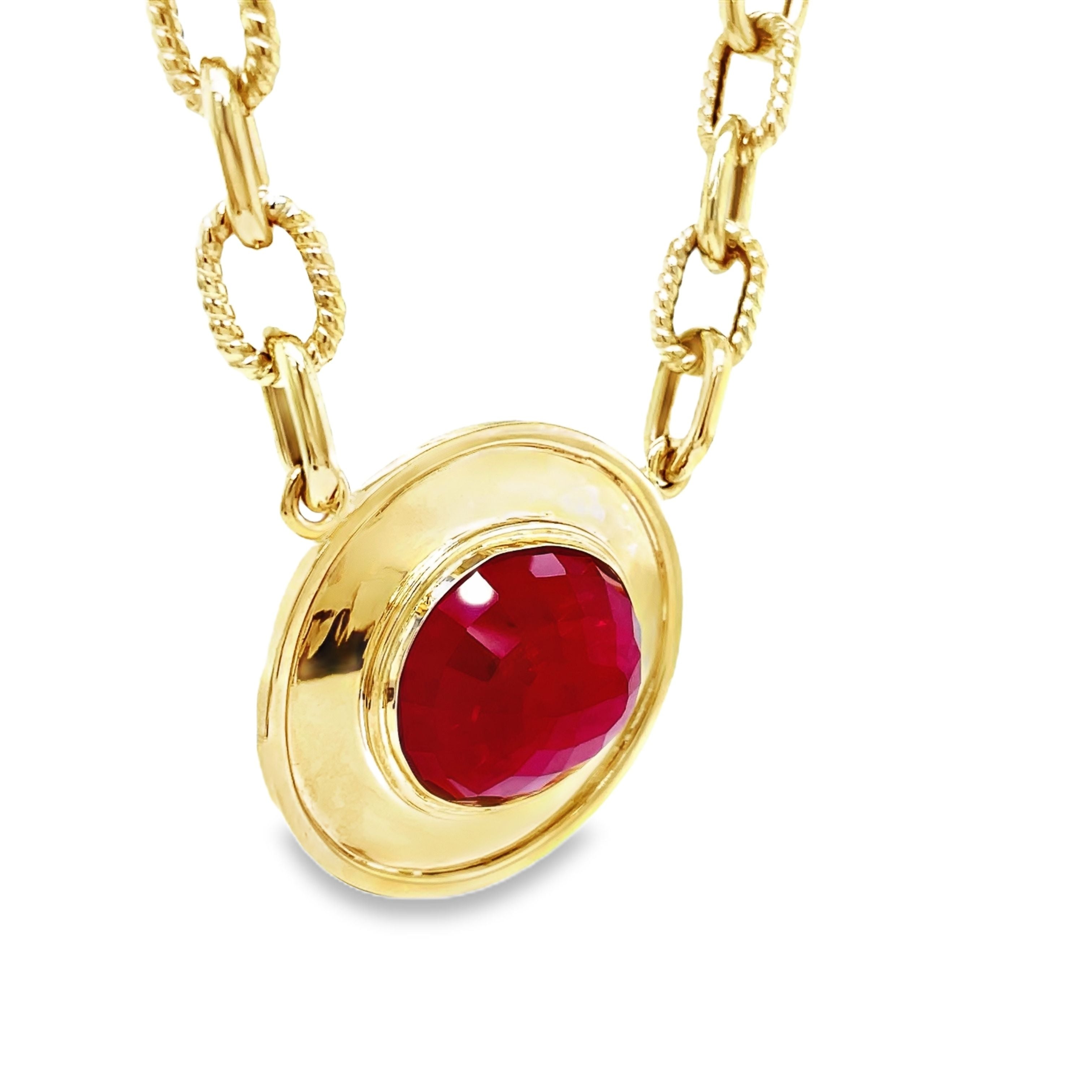 Elevate your look with our Large Oval Ruby Necklace, featuring a stunning 23.00 x 20.00 mm ruby set in a sturdy 14k yellow gold bezel. Handcrafted with care and Italian finesse, this necklace is secured by an elegant lobster catch and a 18" long open link chain