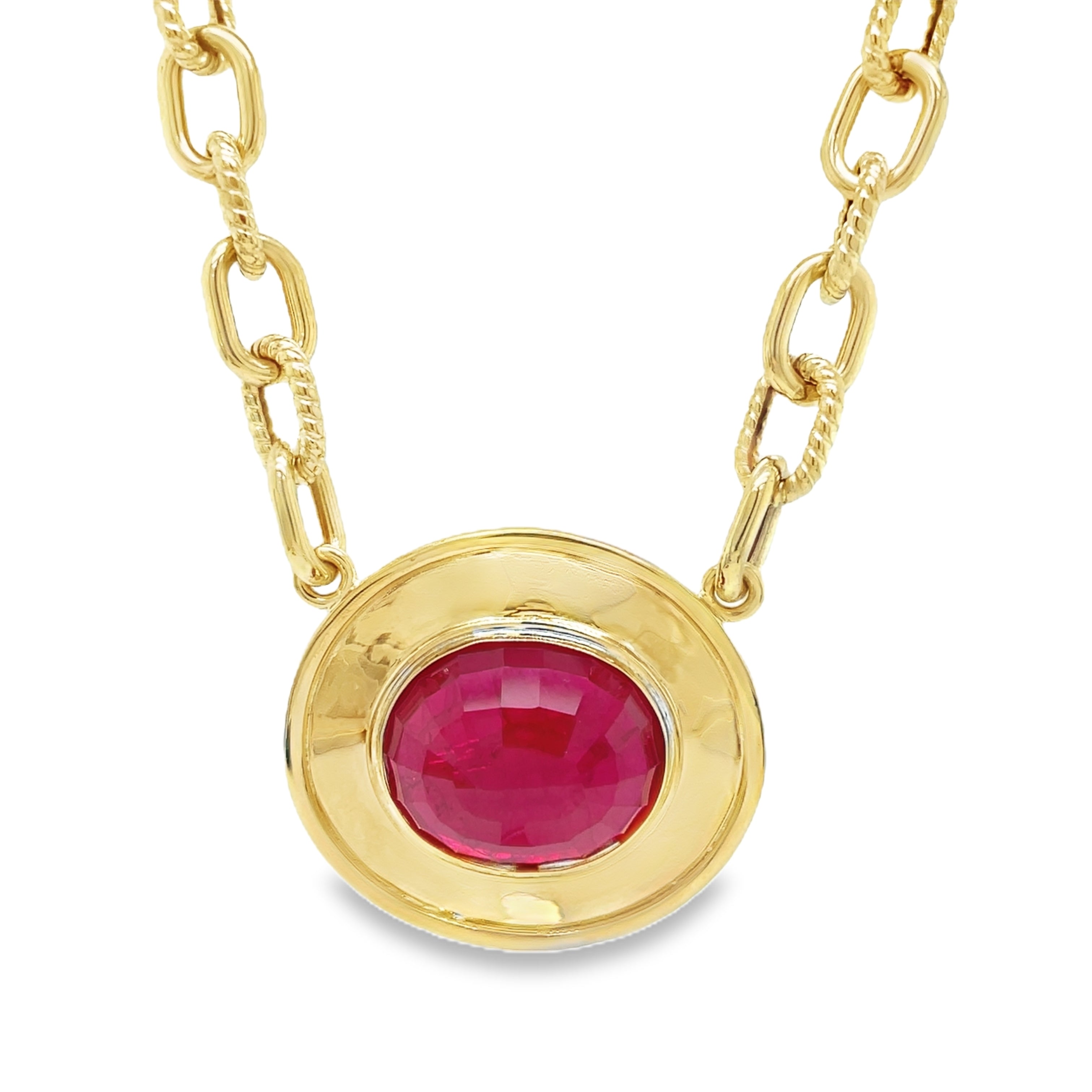 Elevate your look with our Large Oval Ruby Necklace, featuring a stunning 23.00 x 20.00 mm ruby set in a sturdy 14k yellow gold bezel. Handcrafted with care and Italian finesse, this necklace is secured by an elegant lobster catch and a 18" long open link chain