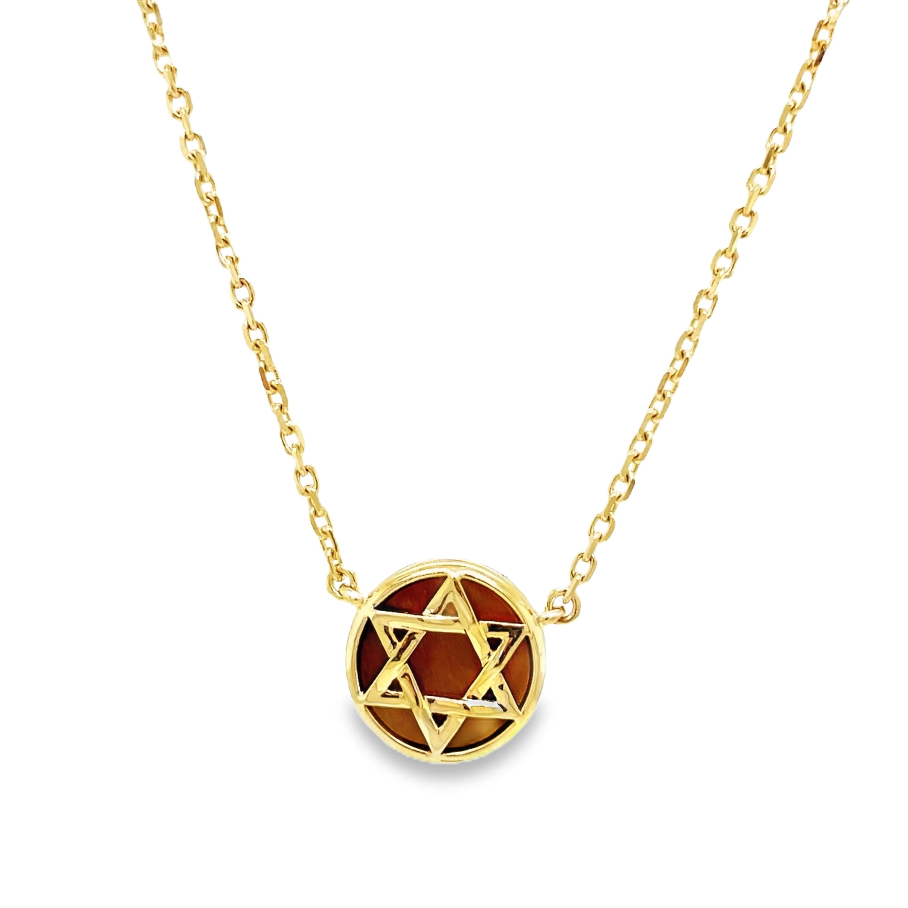 Discover the beauty of our 14k Tiger Eye Star of David Necklace. Handcrafted with 15.00 mm of 14k yellow gold and adorned with solid tiger eye background. The 18" long chain features a secure lobster clasp with a sizing loop at 16", ensuring a perfect fit. Elevate your style and embrace luxury with this exclusive piece.