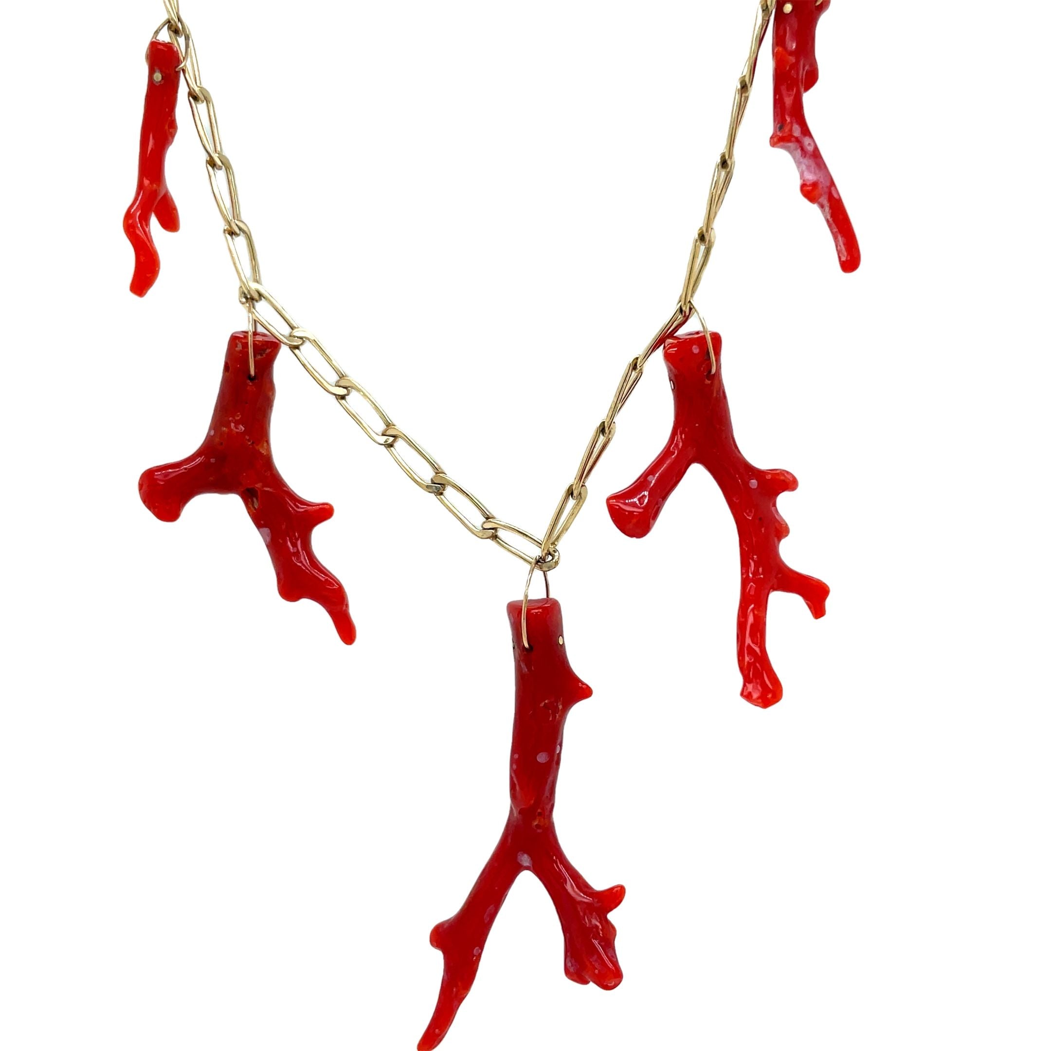 Elevate your jewelry collection with our Five Red Coral Branch Gold Cap Pendant. Crafted with 14k yellow gold and five vibrant red coral branches, this luxurious pendant exudes sophistication and exclusivity. The elegant paperclip chain link and secure lobster catch add a touch of modernity to this timeless piece. Make a statement with this exquisite pendant.