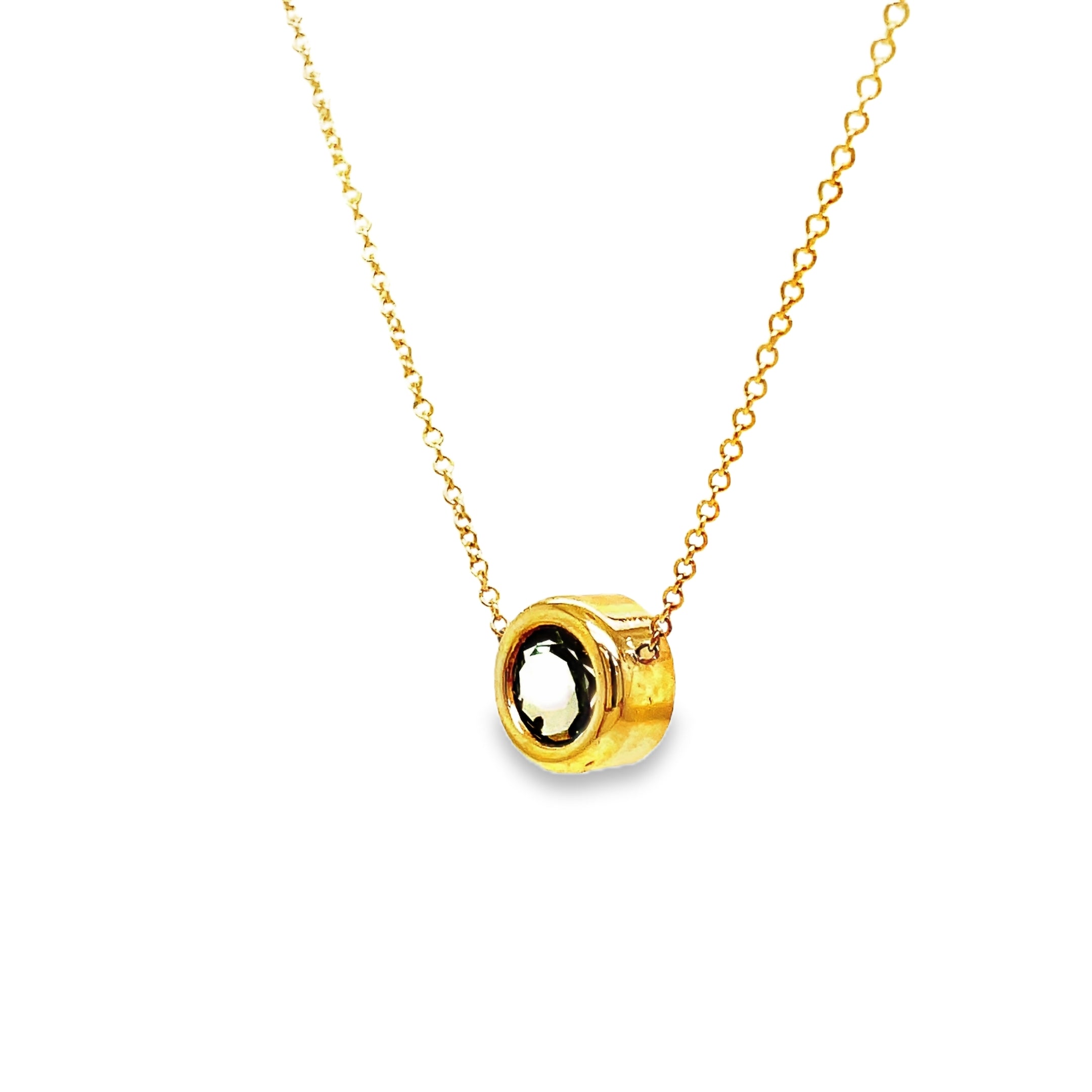 Indulge in the exquisite luxury of our Praziolite Gold Bezel Pendant Necklace. Adorned with a round praziolite gemstone and crafted from 14k yellow gold, this necklace exudes elegance. The delicate 1.1 mm gold chain adds a touch of sophistication. Elevate any outfit with this 18" long necklace.