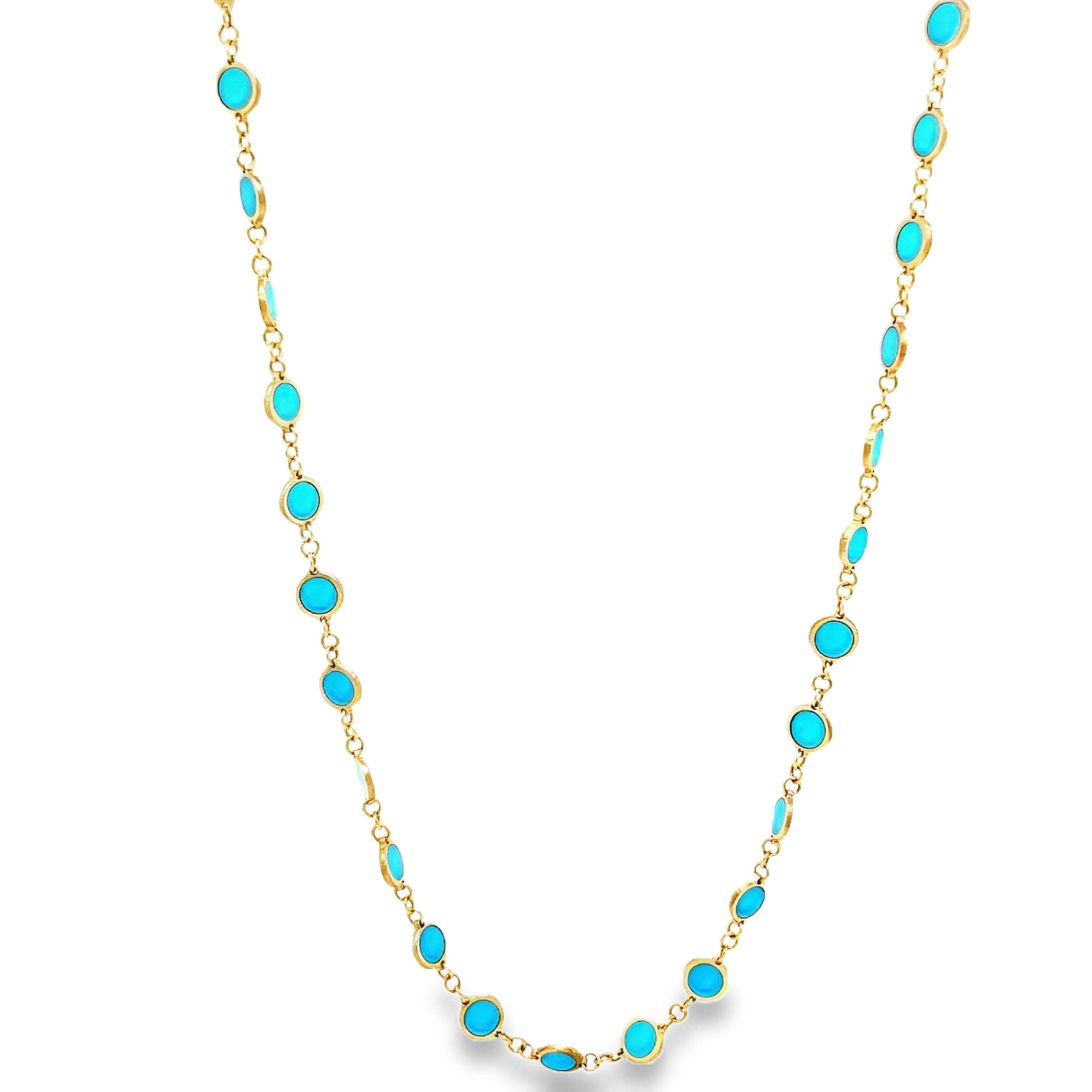 Elevate your style with our Turquoise Disk Necklace. Crafted with 14k yellow gold, this elegant piece features a solid disk suspended on an 18" chain. Adding a touch of sophistication to any ensemble, this necklace is a must-have for any discerning fashionista.