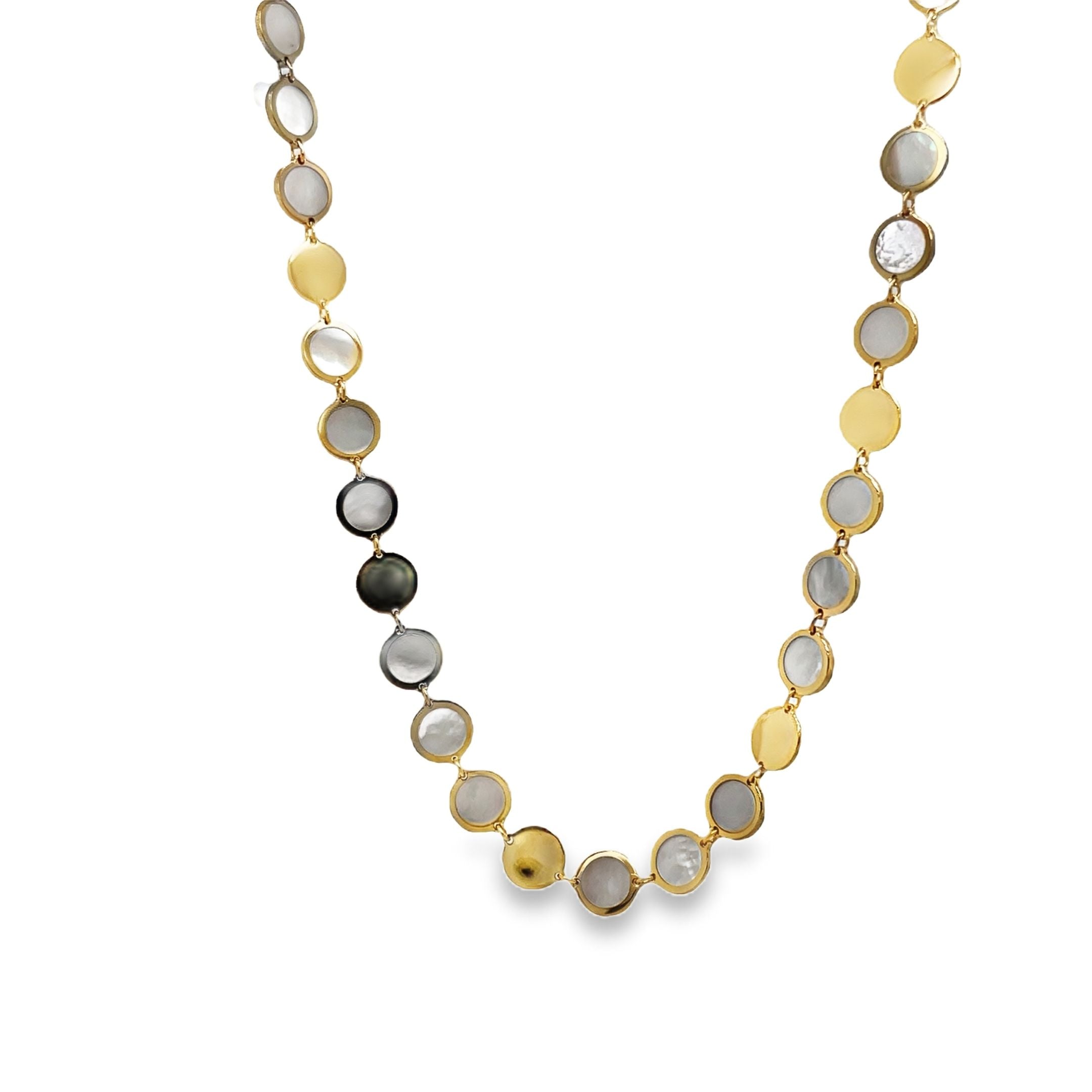 levate your style with our Mother of Pearl Disk Necklace. Crafted with 14k yellow gold, this elegant piece features a solid MOP disk suspended on an 18" chain. Adding a touch of sophistication to any ensemble, this necklace is a must-have for any discerning fashionista.