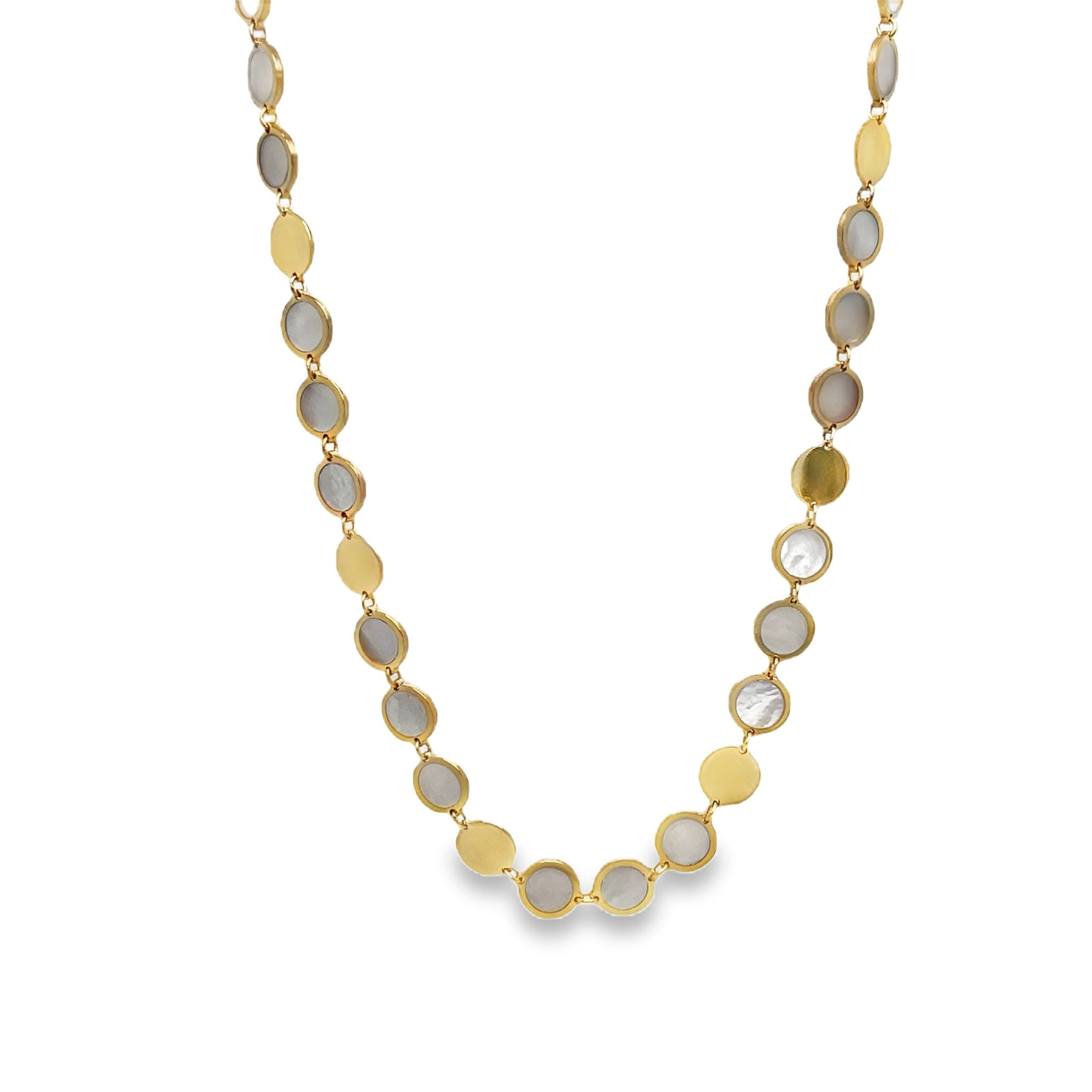 levate your style with our Mother of Pearl Disk Necklace. Crafted with 14k yellow gold, this elegant piece features a solid MOP disk suspended on an 18" chain. Adding a touch of sophistication to any ensemble, this necklace is a must-have for any discerning fashionista.