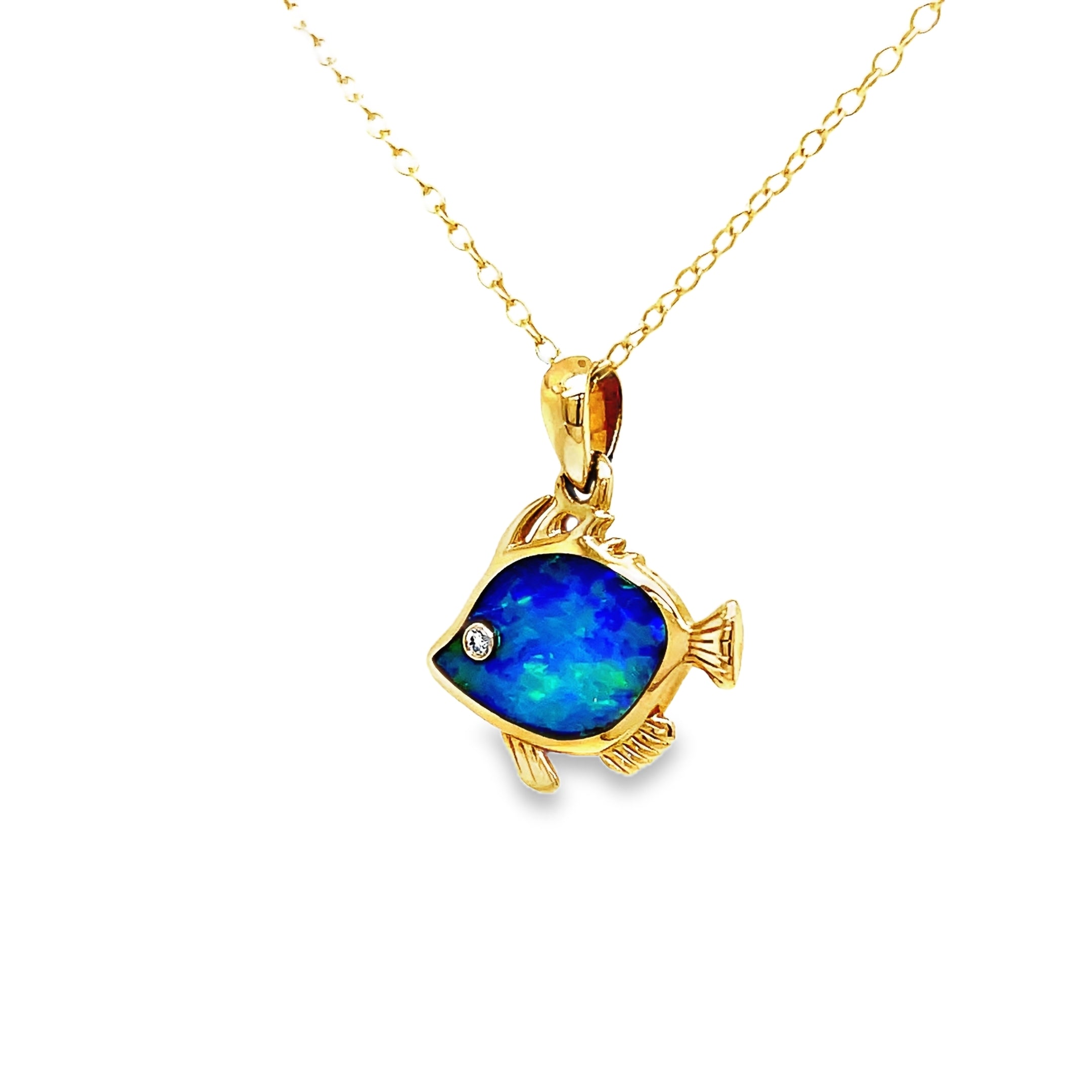 This exquisite 14k Diamond Opal Fish Pendant Necklace is a true work of art. Crafted with lustrous, 14k yellow gold, the play of color opal shimmers with an ethereal glow. The delicate fish pendant, adorned with a sparkling round diamond, adds a touch of whimsy to this luxurious piece. Elevate your wardrobe and make a statement with this one-of-a-kind necklace.