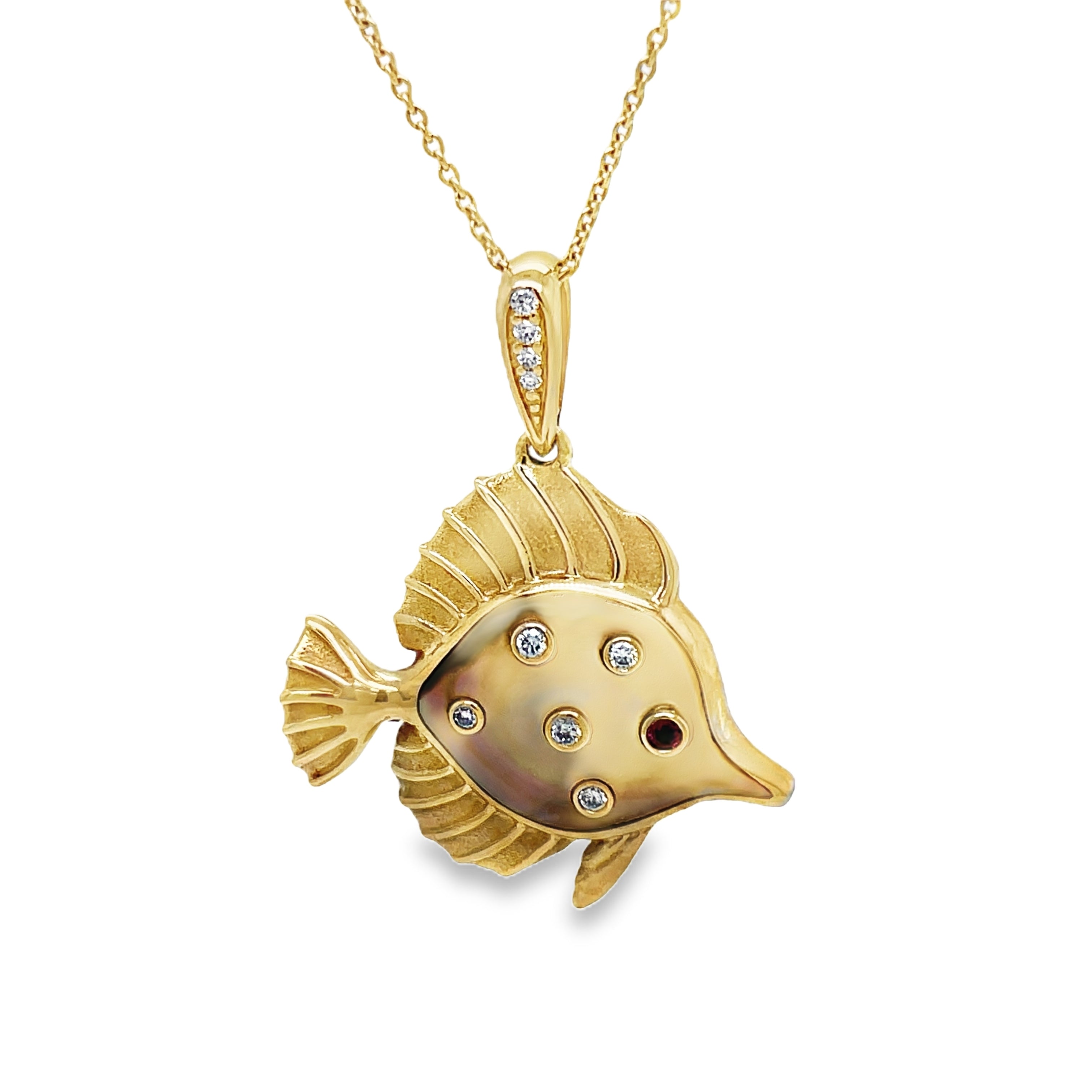 Indulge in sophistication with our 14k Diamond and MOP Fish Pendant Necklace. Crafted from luxurious 14k yellow gold, this necklace features a beautiful MOP fish pendant adorned with round diamonds and a stunning round ruby. Elevate any look with this elegant and exclusive piece.