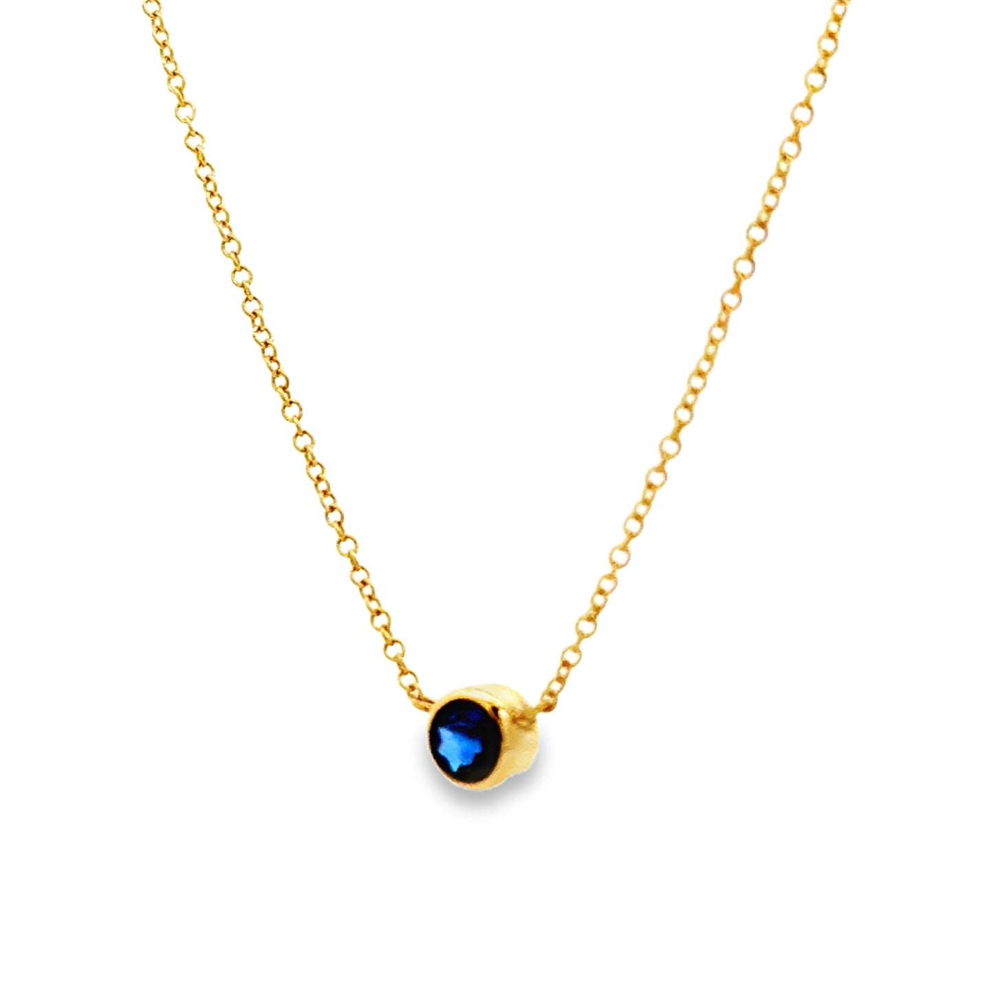 Side view of 14k Yellow Gold Small Solitaire Sapphire Pendant Necklace
