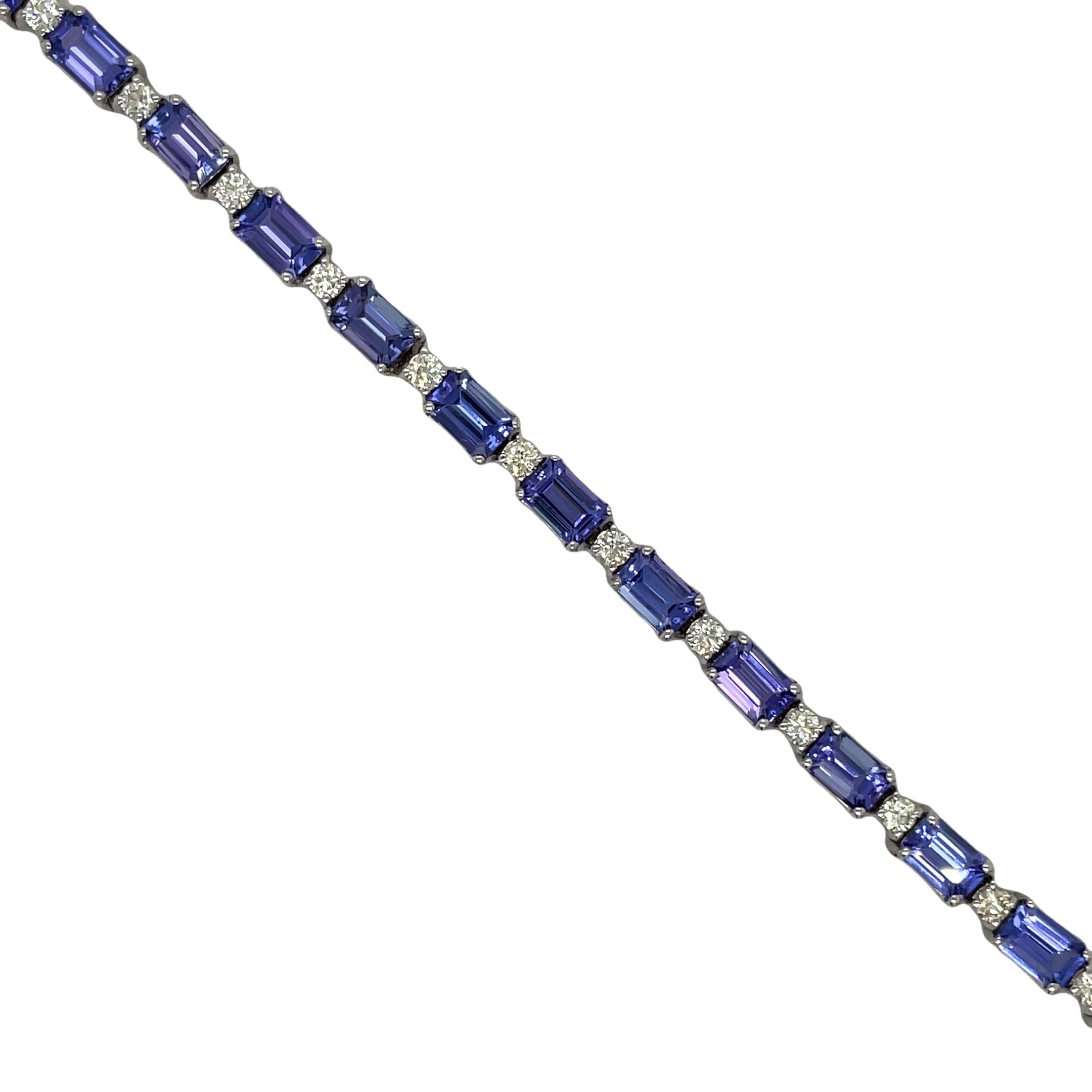 Indulge in luxury with our Fine Diamond &amp; Tanzanite Rectangular Shape Bracelet. Crafted with 14k white gold, this stunning piece features a radiant 11.35 cts rectangular tanzanite gem and sparkling round diamonds. Elevate any outfit with this exquisite bracelet that exudes sophistication and exclusivity.