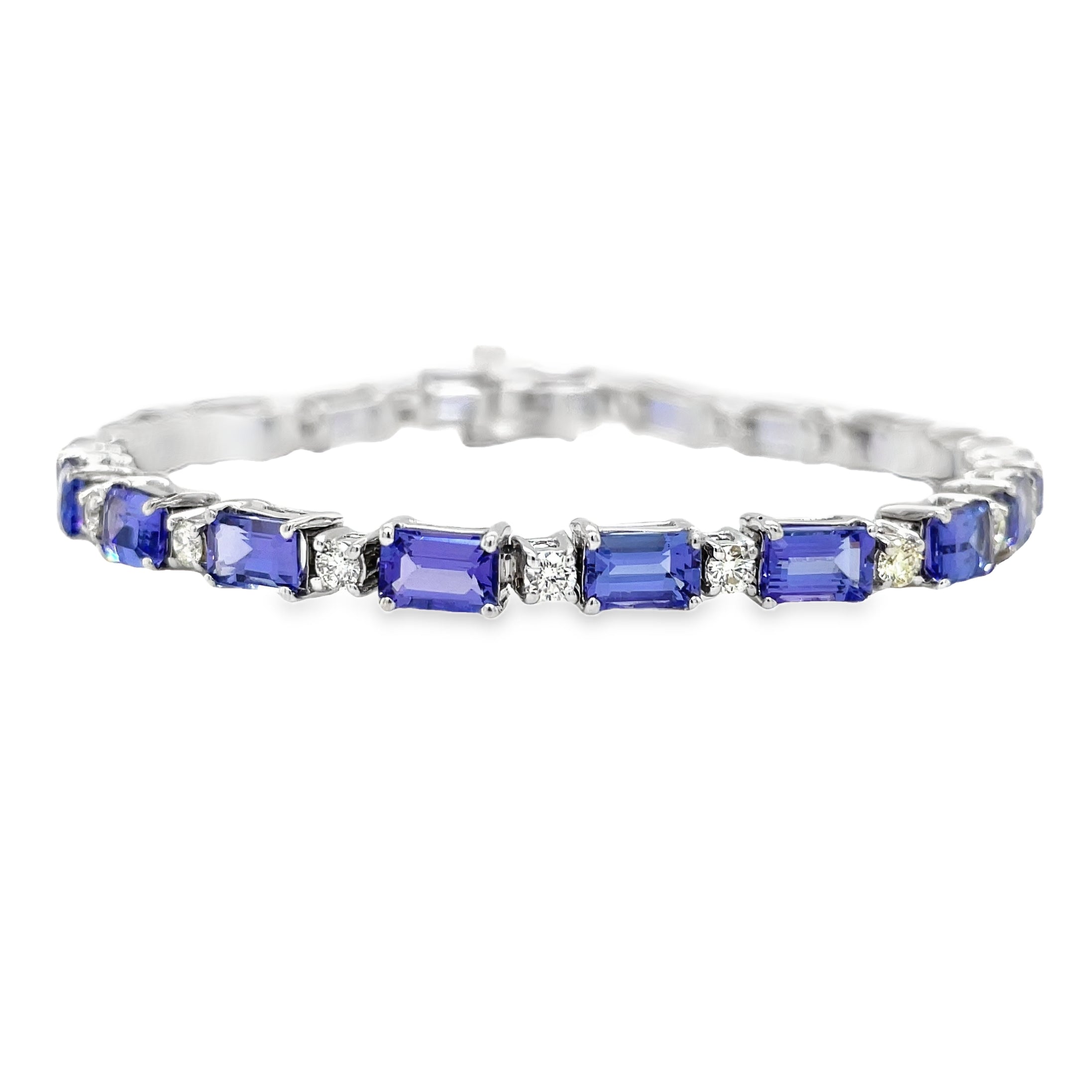 Indulge in luxury with our Fine Diamond &amp; Tanzanite Rectangular Shape Bracelet. Crafted with 14k white gold, this stunning piece features a radiant 11.35 cts rectangular tanzanite gem and sparkling round diamonds. Elevate any outfit with this exquisite bracelet that exudes sophistication and exclusivity.