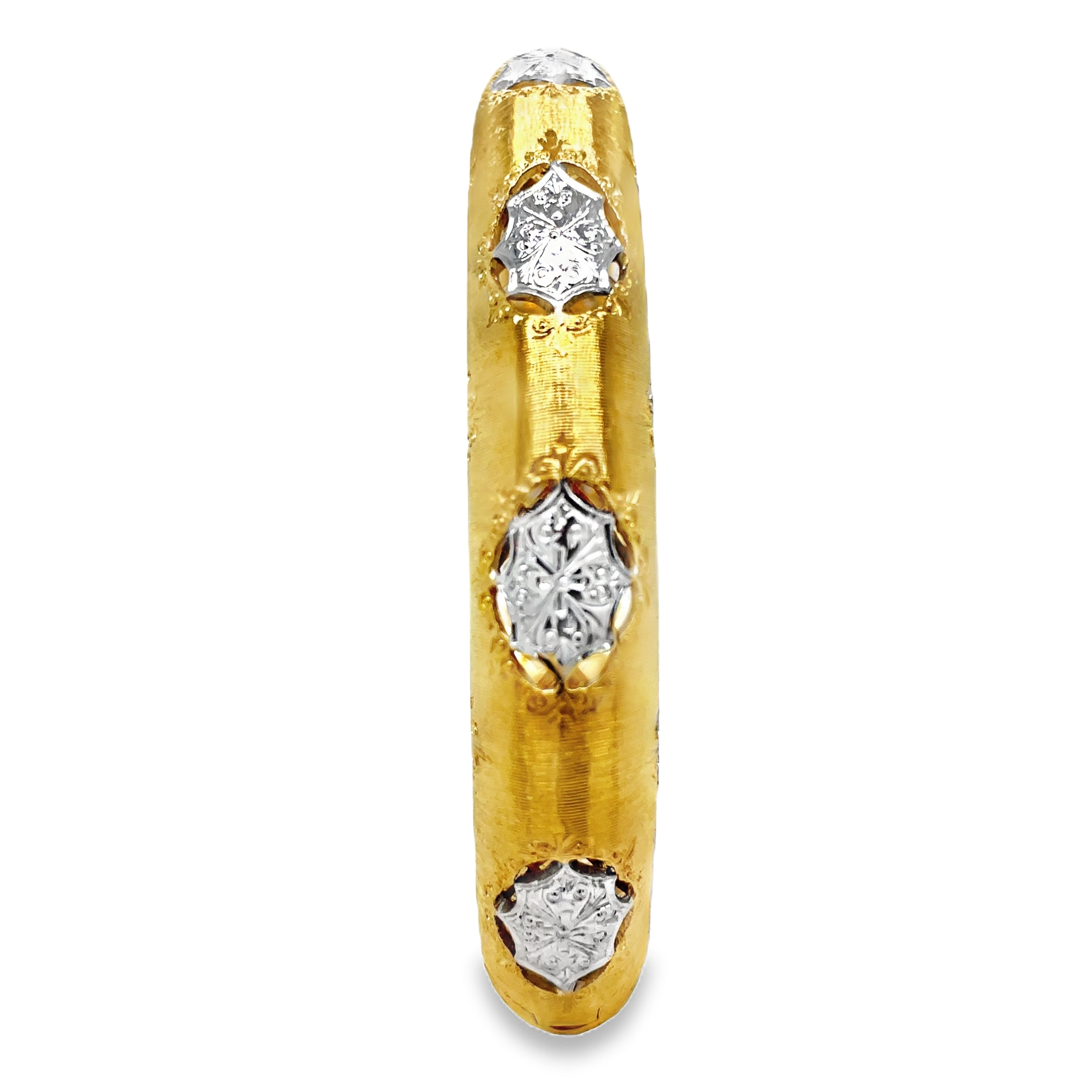 Elevate your style with our Italian 18K Yellow Gold Diamond Bangle Bracelet. Handcrafted with 18K gold, this exquisite piece features round diamonds for a total of 0.50 cts. The brushed finish adds a touch of elegance and sophistication. Indulge in luxury and make a statement with this Italian-made bracelet.