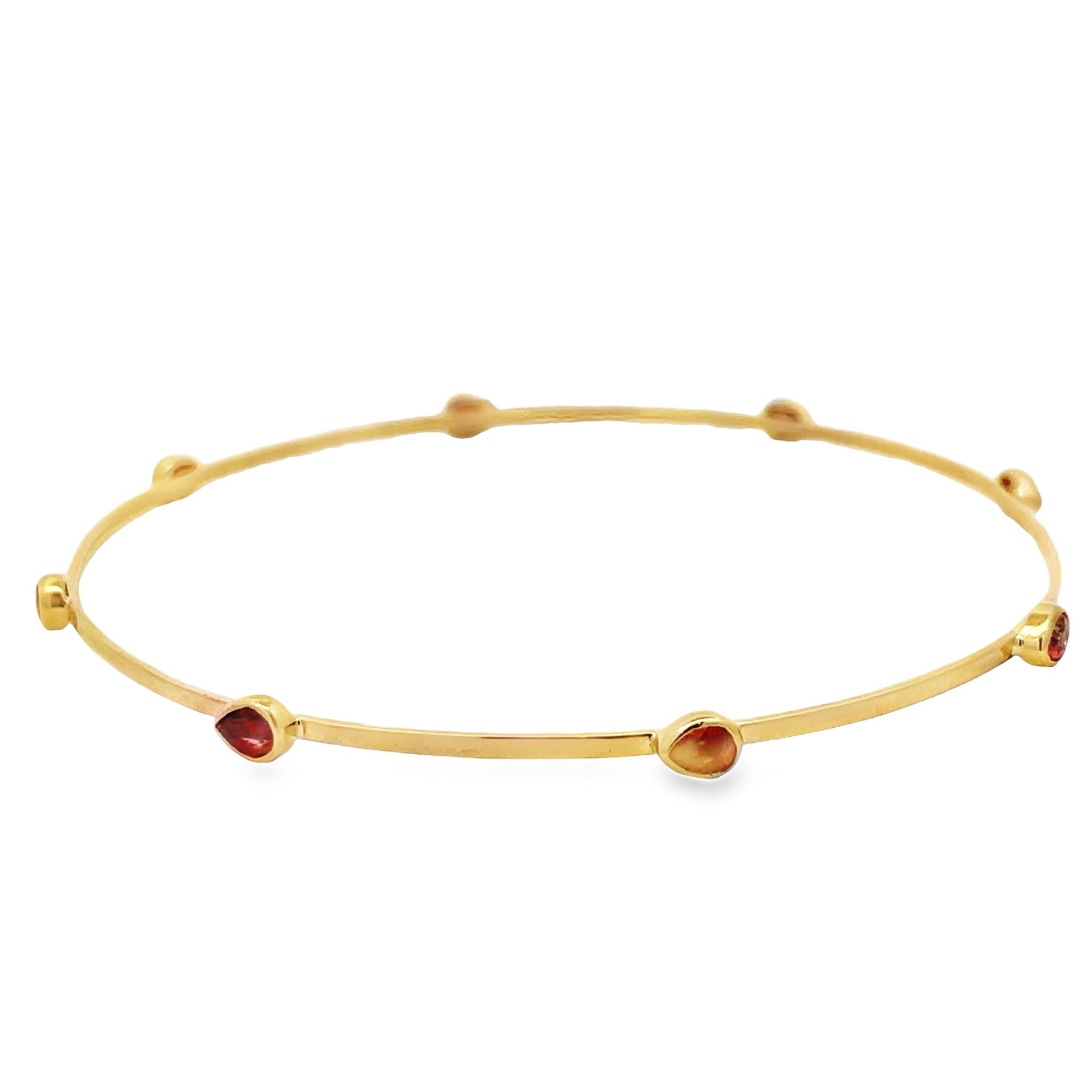 Top view of 14k Yellow Gold Orange Sapphire Bangle 