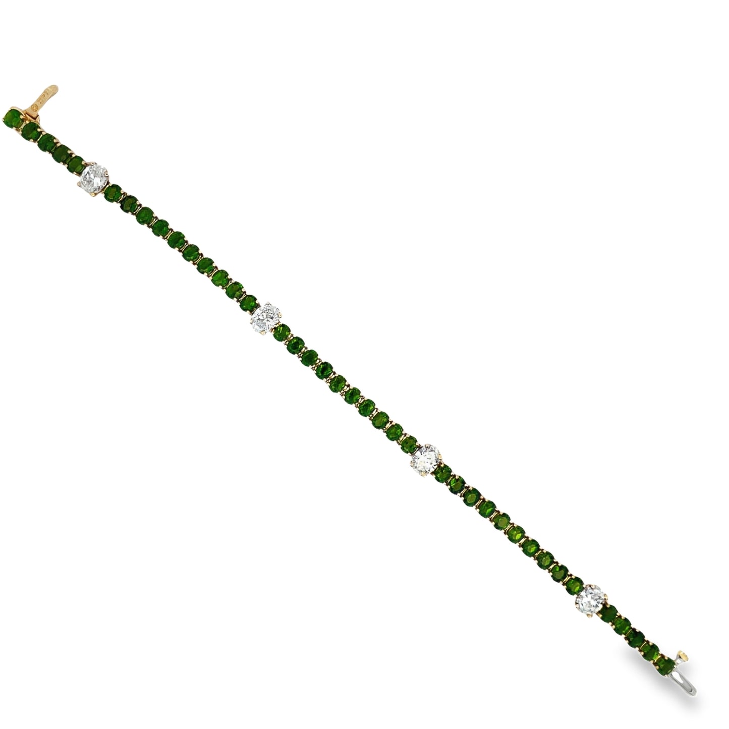 Top view of Tsavorite Garnets and Oval Cut Diamond Line Bracelet 
