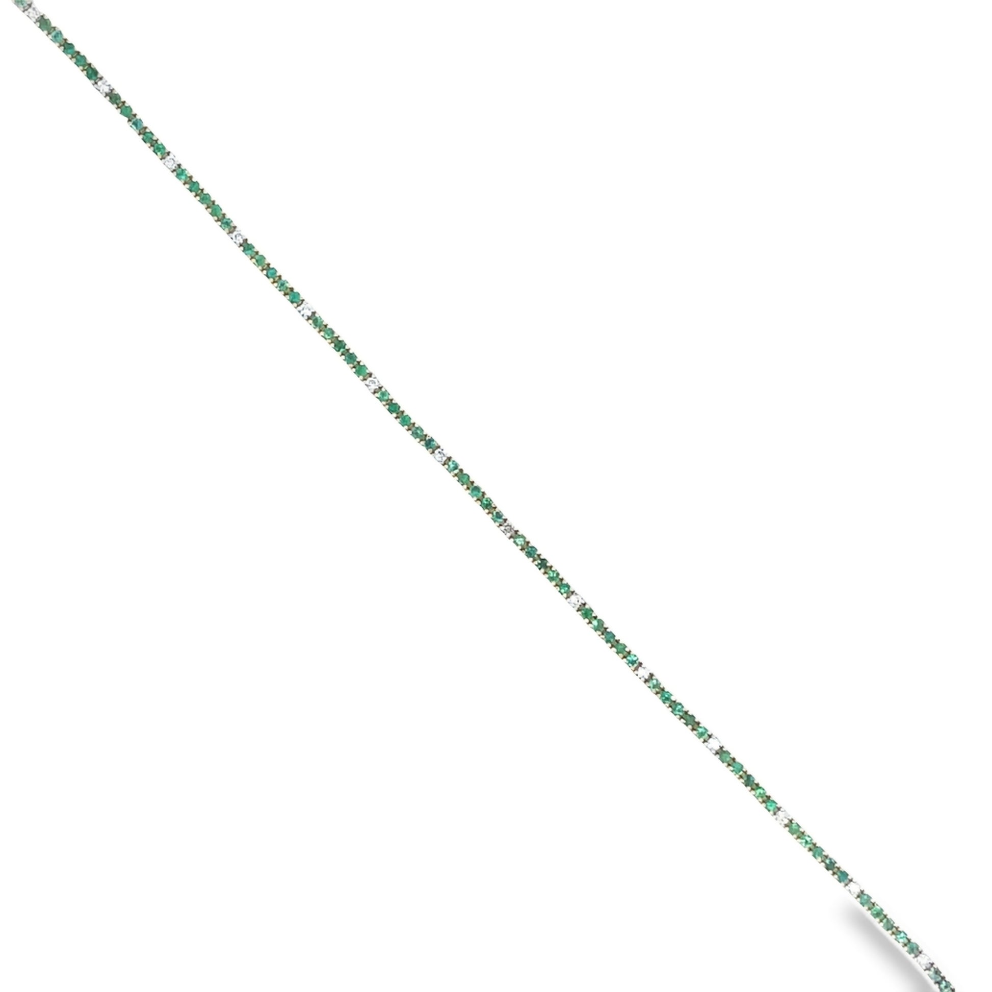 Top view of 14k Yellow Gold Emerald & Diamond Line Bracelet 