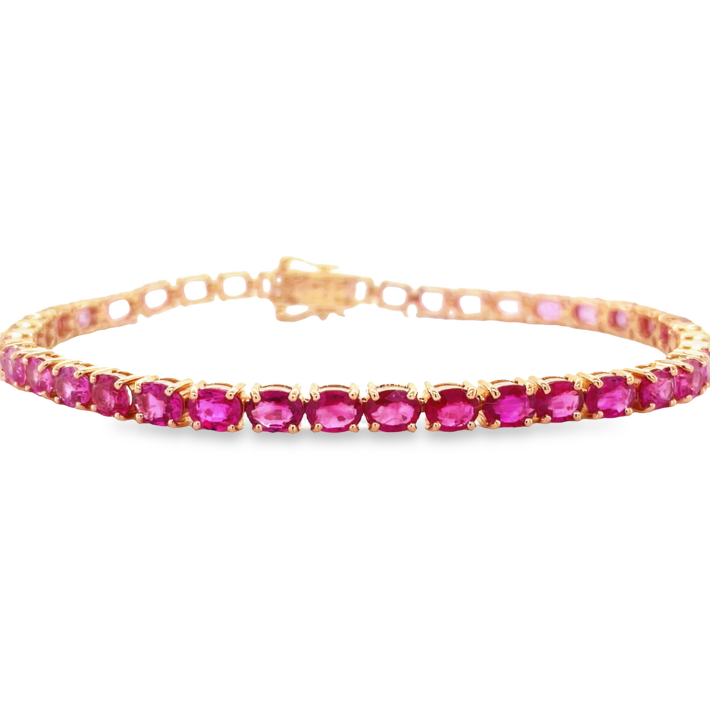 This stunning 18k rose gold bracelet features high quality oval cut multi-shade pink sapphires, from deep hot pink hues to soft lavender shades. The delicate design showcases the vibrant colors and offers a unique bracelet for any occasion.