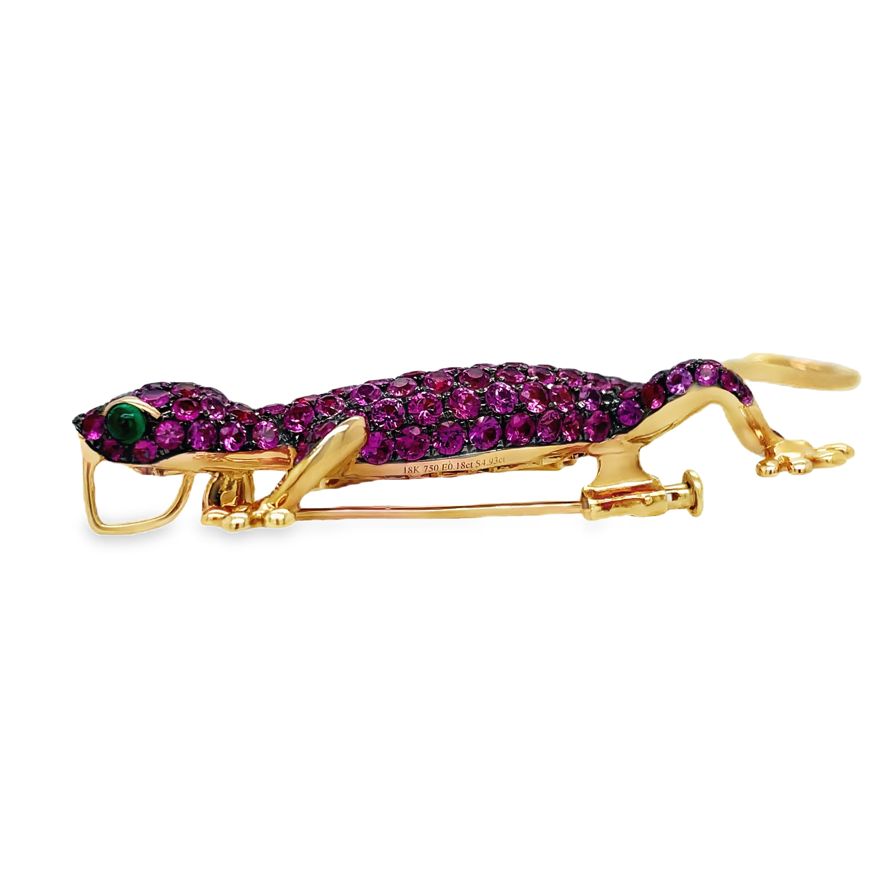 Indulge in timeless elegance with our Pink Sapphire and Emerald Lizard Brooch. Crafted from 18k rose gold, this luxurious piece features two mesmerizing emerald eyes and delicate pink sapphires. Versatile as both a pendant and brooch, this lizard adds a touch of sophistication to any outfit. Make a statement with this unique and stunning accessory.