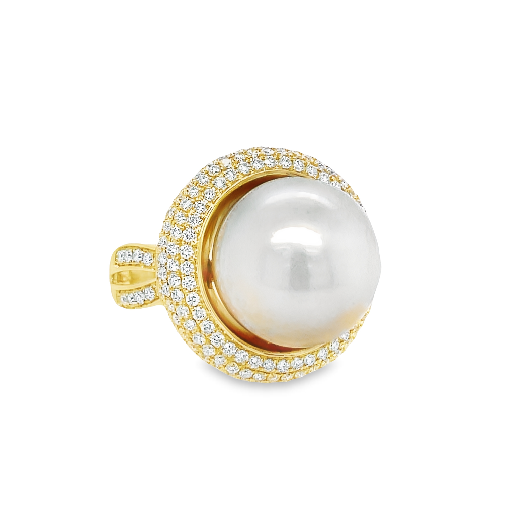 Feel the luxuriousness of this Large South Sea Pearl Diamond Halo Ring! Crafted with 14.00 mm south sea pearl, 18k yellow gold, and round diamonds 1.31 cts, this piece is a brilliant statement of style. Transform any look with its sophisticated sparkle.