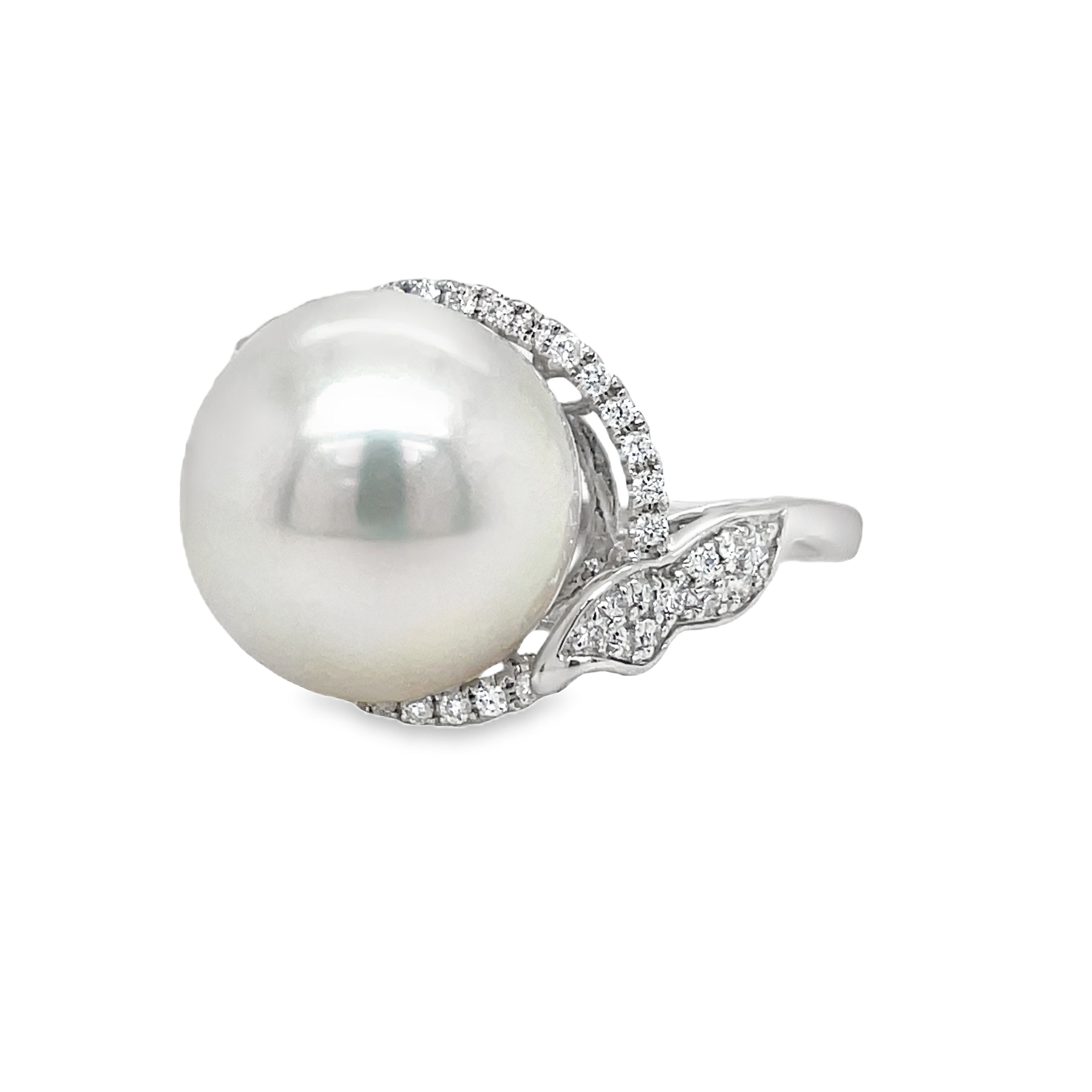 This Large South Sea Pearl Diamond Ring features a stunning 12.50 mm south sea pearl with great luster set in 14k white gold. The round diamonds, totaling 0.28 carats, add a touch of elegance and luxury. Elevate any outfit with this exquisite piece of jewelry.