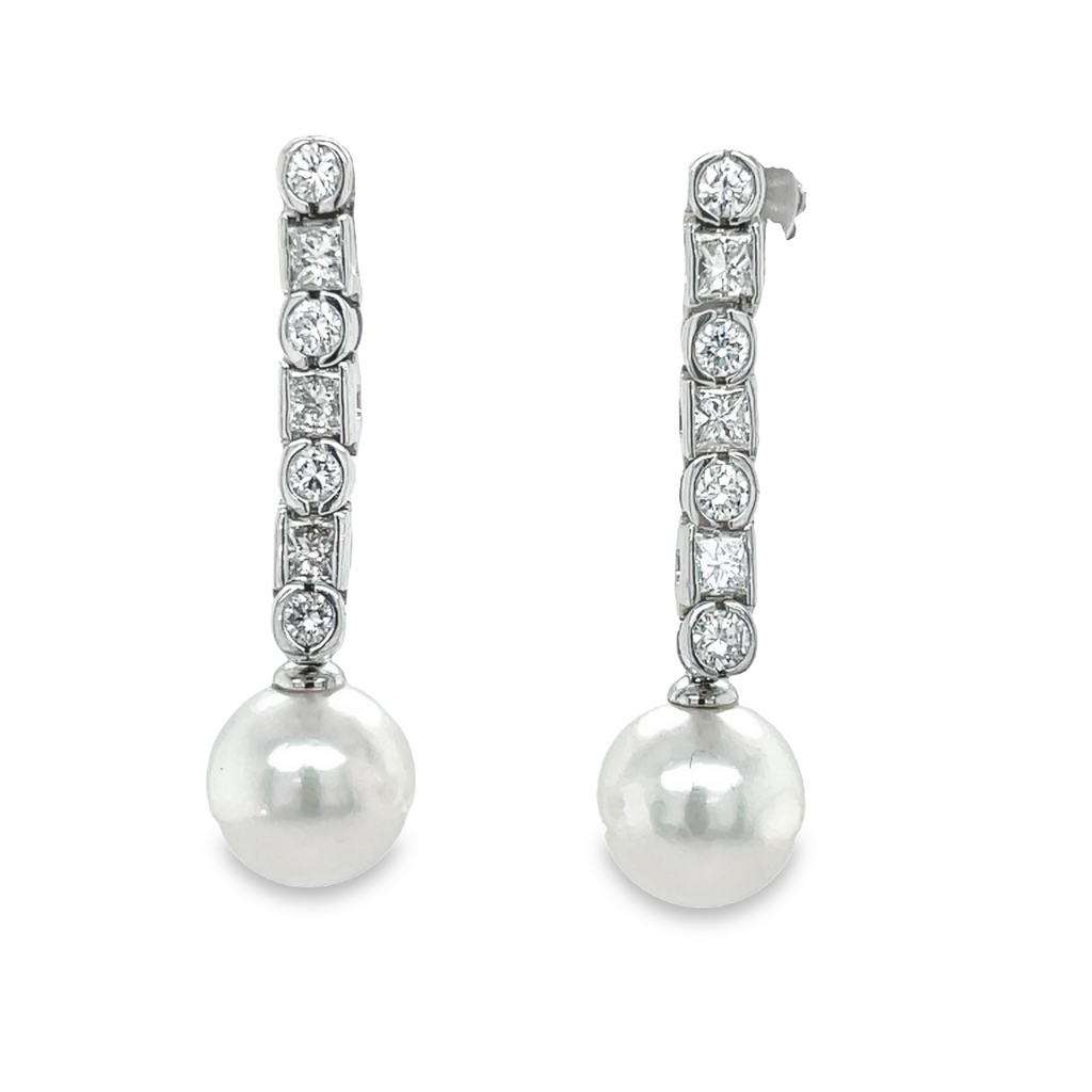Unforgettable and stylish, these pearl & diamond drop earrings feature 10.00 mm akoya pearls with an exquisite luster and color. A unique feature, each pearl is removable so you can have a second pair of just diamond drop earrings! (150-321 $2850.00).