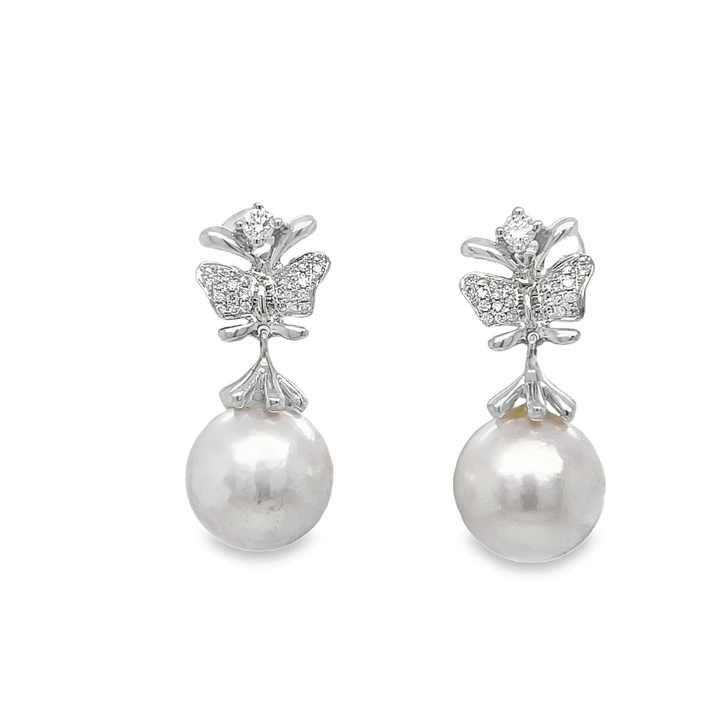 Enhance any outfit with our stunning Diamond Butterfly & Akoya Pearl Drop earrings. Crafted with 14k white gold, these earrings feature sparkling round diamonds and lustrous akoya cultured pearls measuring 8.00 mm. Perfect for adding a touch of elegance and sophistication to your look!