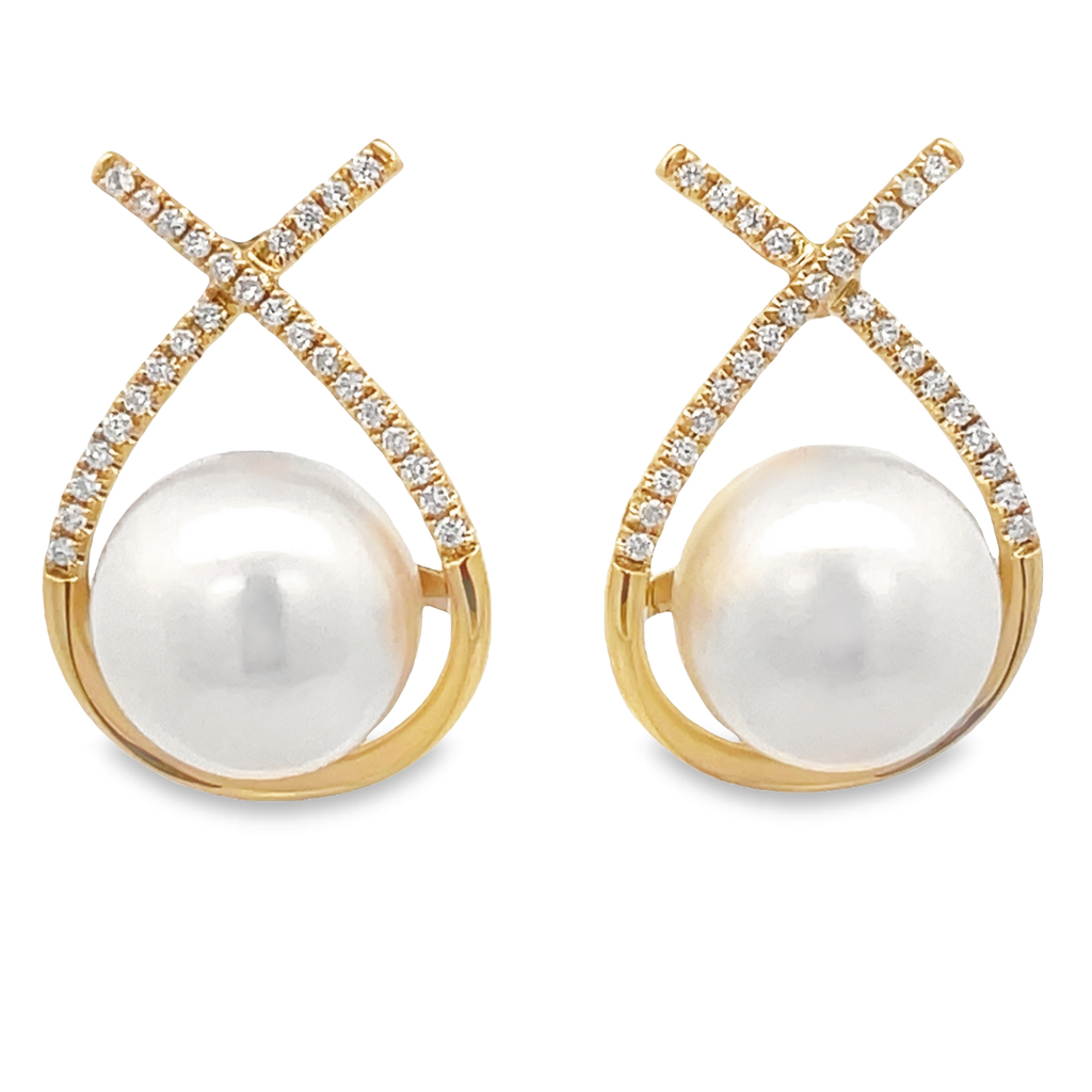 Light up any room with these sparkling Fancy Design Diamond & Fresh Water Pearl Earrings. The delicate diamonds 0.17 cts encircle the vivid 10.00 mm pearls, set in radiant 18k yellow gold. A stunningly beautiful combination that's sure to make a statement.
