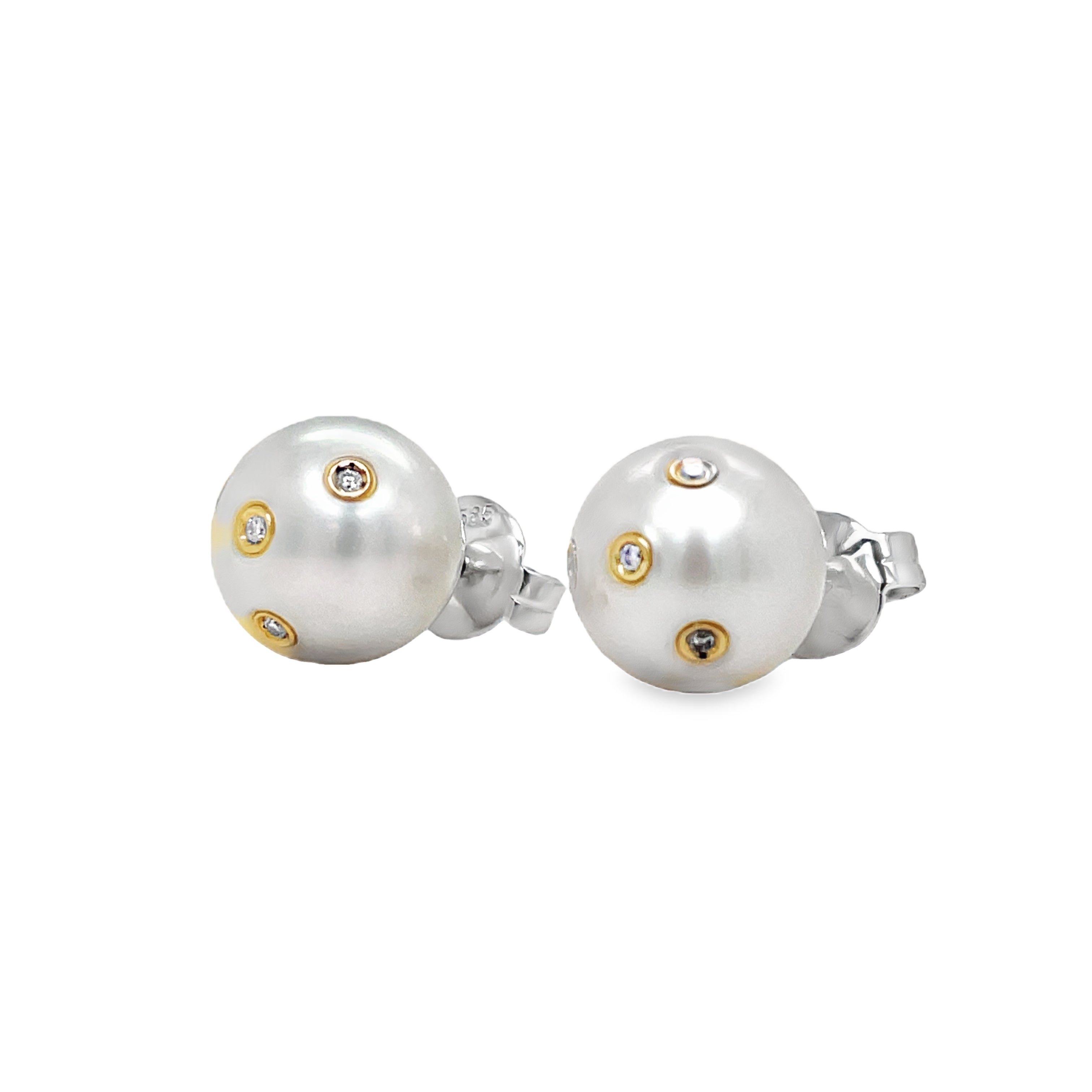 ndulge in pure luxury with our South Seas Embedded Diamond Stud Earrings. Crafted from 14K white gold, these elegant earrings feature stunning 10.00 mm south sea pearls surrounded by embedded diamonds totaling 0.20 cts. With secure friction backs, these earrings offer both style and practicality. Elevate your look with these exquisite earrings.