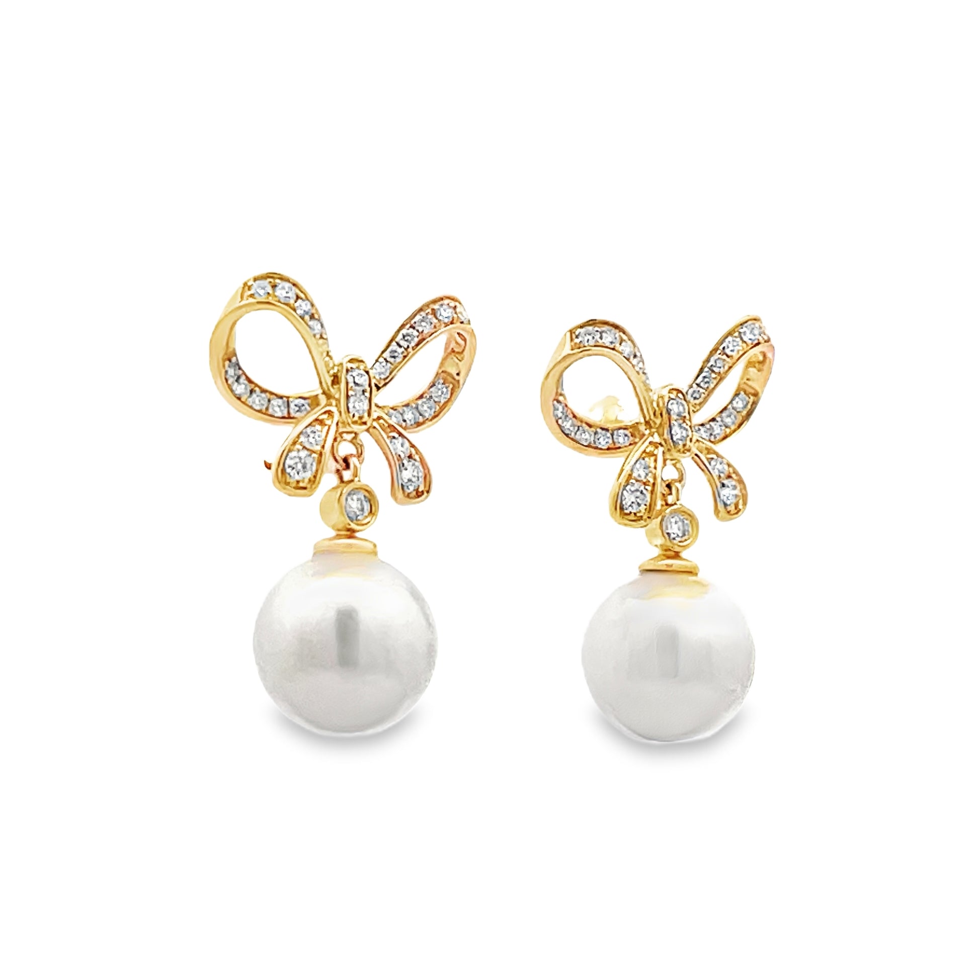 Side view of 14k Yellow Gold Diamond Bow Drop Pearl Earrings
