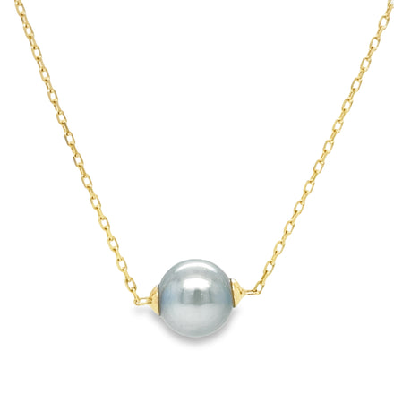 This Tahitian Single Pearl Necklace is the perfect accessory for any occasion. Crafted with 18k yellow gold chain, the 16" long necklace radiates sophistication and style. Show the world that you don't just own jewelry - you make a statement.   