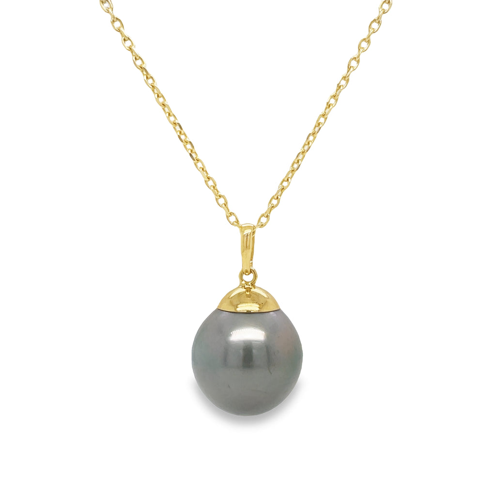 This Tahitian Single Pearl Necklace is the perfect accessory for any occasion. Crafted with 18k yellow gold, this necklace radiates sophistication and style. Show the world that you don't just own jewelry - you make a statement.   14k yellow gold chain 18" $620 (optional) 