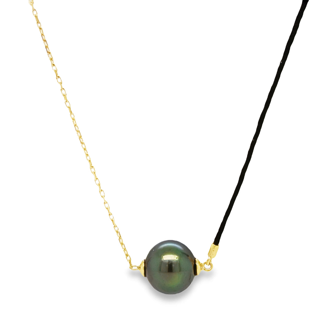 This Tahitian Single Pearl Necklace is the perfect accessory for any occasion. Crafted with 18k yellow gold, the 16" long necklace features a half gold chain and half silk cord - an elegant combination that radiates sophistication and style. Show the world that you don't just own jewelry - you make a statement.