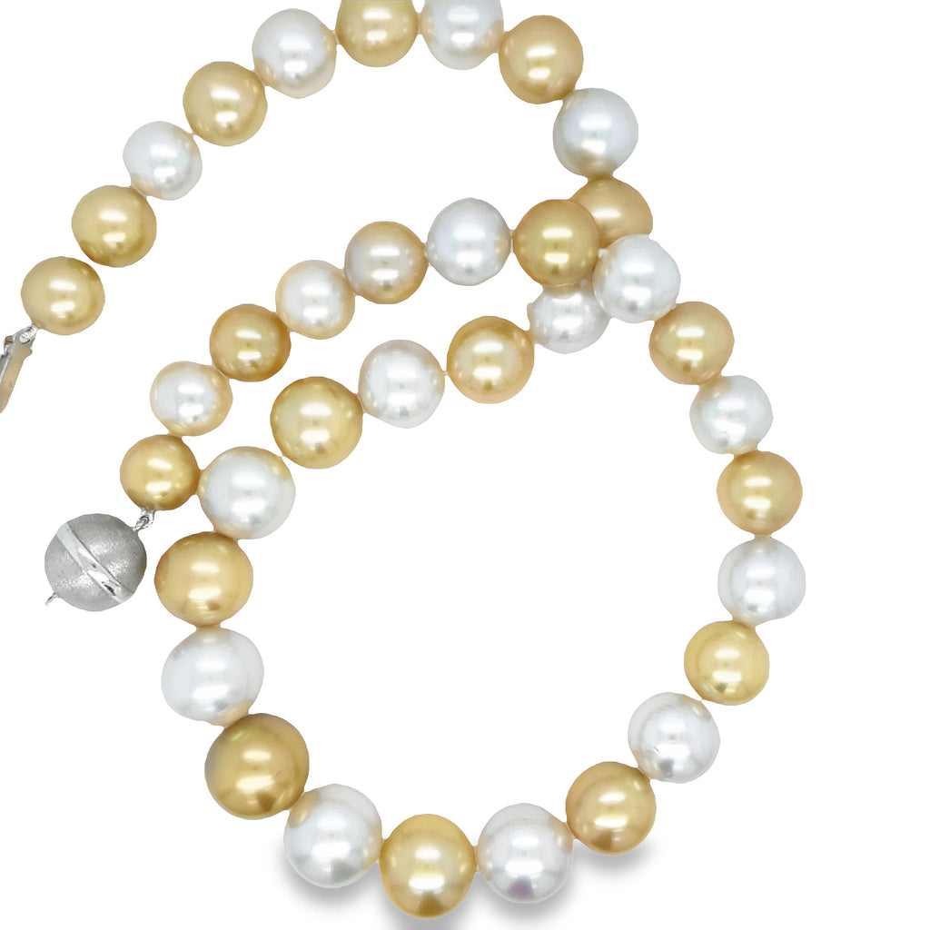 Dazzle with this gorgeous Golden South Sea Pearl Necklace! Featuring 17" of stunning pearls, from golden yellow to crisp white, boasting an incredible luster, you'll be the belle of the ball! Layer in luxe with this stunning statement necklace!