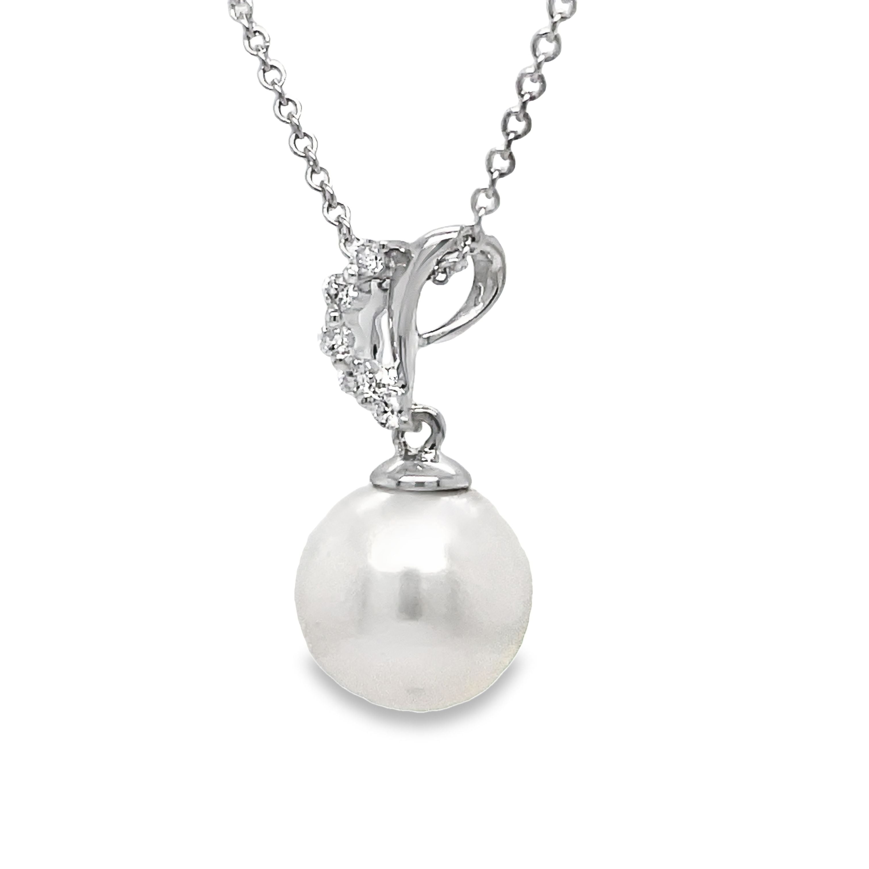 This 14k white gold necklace features a stunning South Sea pearl with great luster and color measuring 10.00 mm. The pearl is accented by a five stone diamond pendant and comes accompanied by an 18" white gold chain. Elevate any look with this elegant and timeless piece.