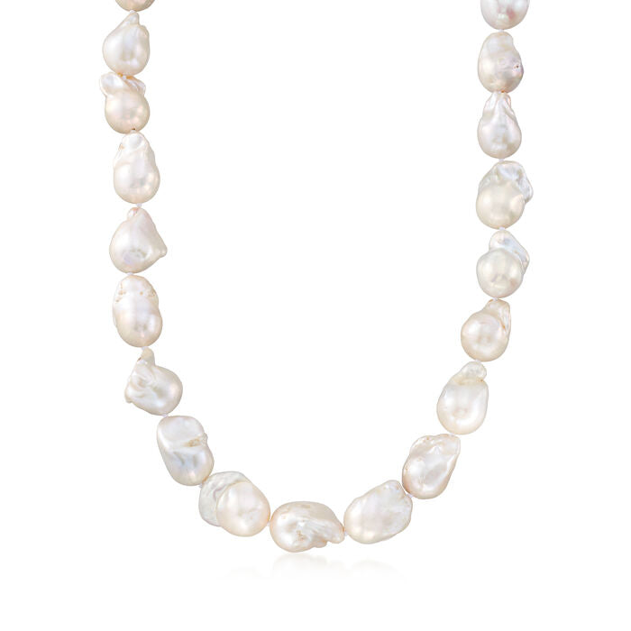 Discover the unique beauty of our Baroque Pearl Necklace. Each fresh water pearl measures from 28.00 to 25.00 mm, creating a one-of-a-kind necklace. The sterling silver clasp adds a touch of elegance to this 18" long piece, making it a timeless addition to your collection.