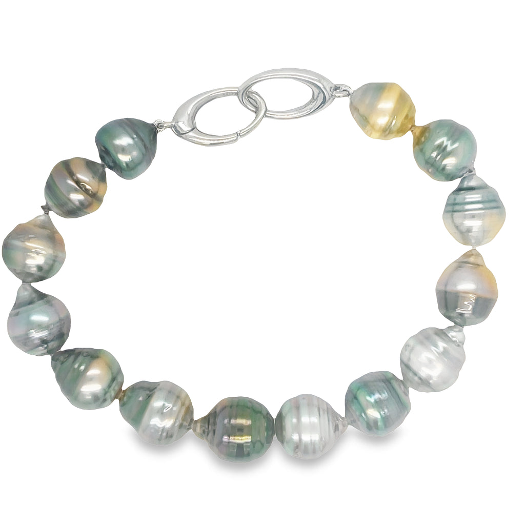This stunning Tahitian Baroque Pearl Bracelet features 9.50 mm pearls with great luster and a variety of colors. Secured with 14k white gold triggerless clasp for easy grip, this bracelet is a timeless beauty.