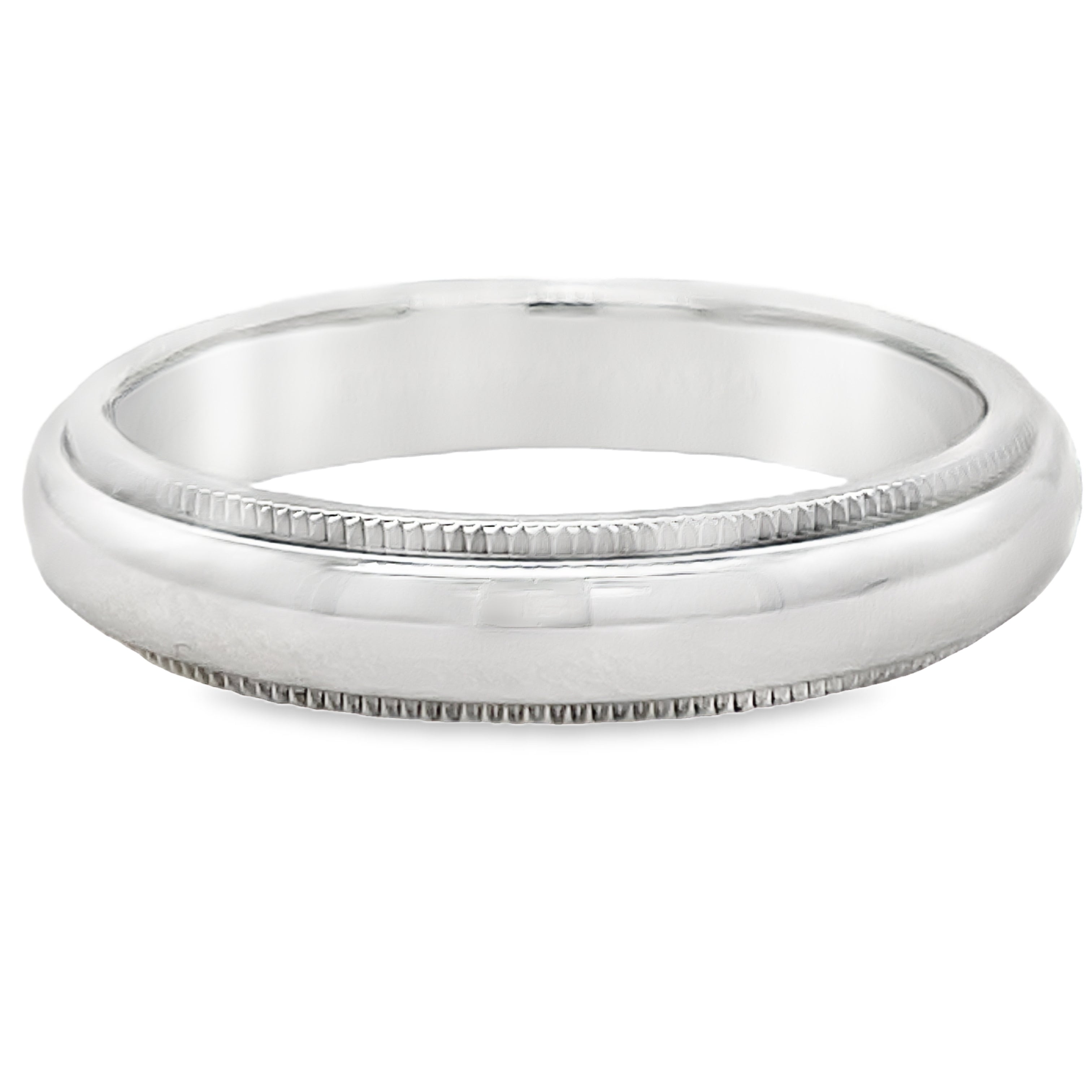 ndulge in timeless elegance with our Estate Tiffany and Co. Milgrain Wedding Band. Crafted by the renowned Tiffany &amp; Co., this ring features a delicate milgrain design and is made with the finest platinum. Measuring 4.00 mm wide, it is the perfect symbol of everlasting love and luxury.