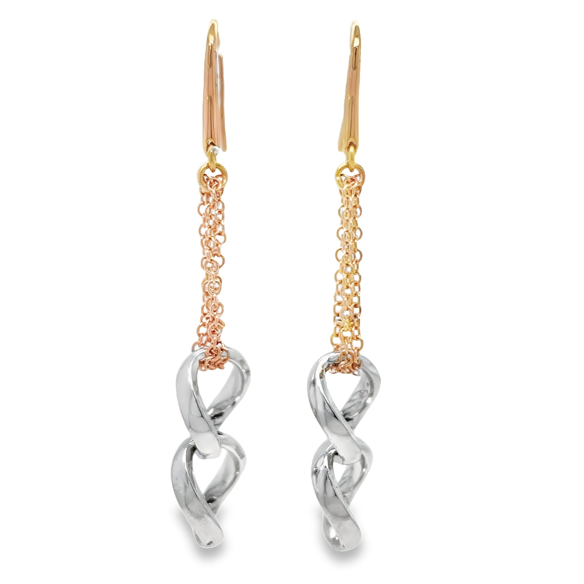 "Transform your look with our stunning 18K Italian Two-Tone Long Earrings. Crafted from 18k rose and white gold, these elegant earrings feature a delicate double chain link design and large link loops that add a touch of sophistication to any outfit. Measuring 2.5 inches, they make a bold fashion statement. Elevate your style with these luxurious earrings."