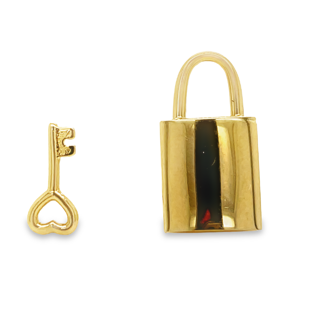 These stunning Italian-made earrings feature a classic locket and key pair crafted from 14k yellow gold. The locket and key measure 15.00mm and 10.00mm respectively and feature friction backs for secure wear. A perfect addition to any jewelry collection.