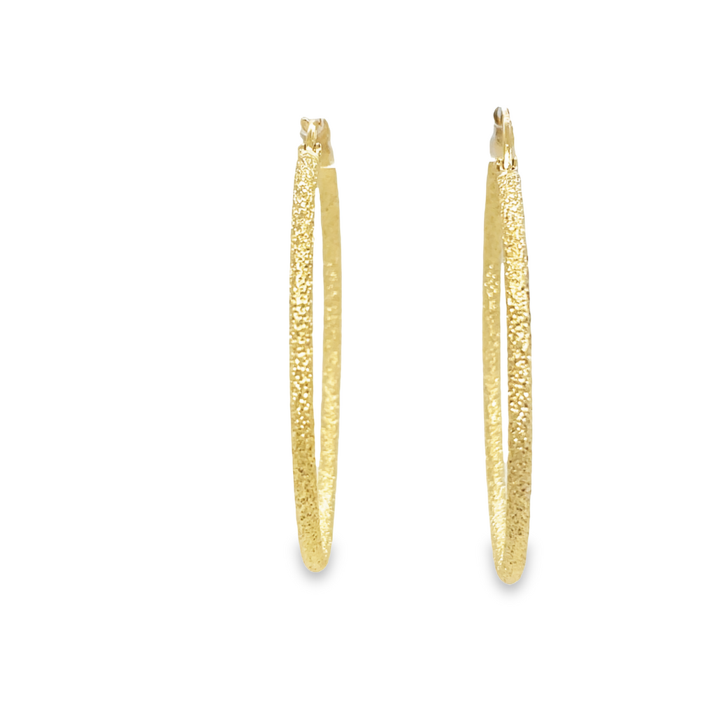 These Italian Gold Matte Finish Hoops Earrings offer beautiful craftsmanship in a classic style. Create effortless, timeless looks with the 2.00 mm thickness, 1.5" diameter, and hand-finished matte finish. Stand out from the crowd wearing these elegant earrings.