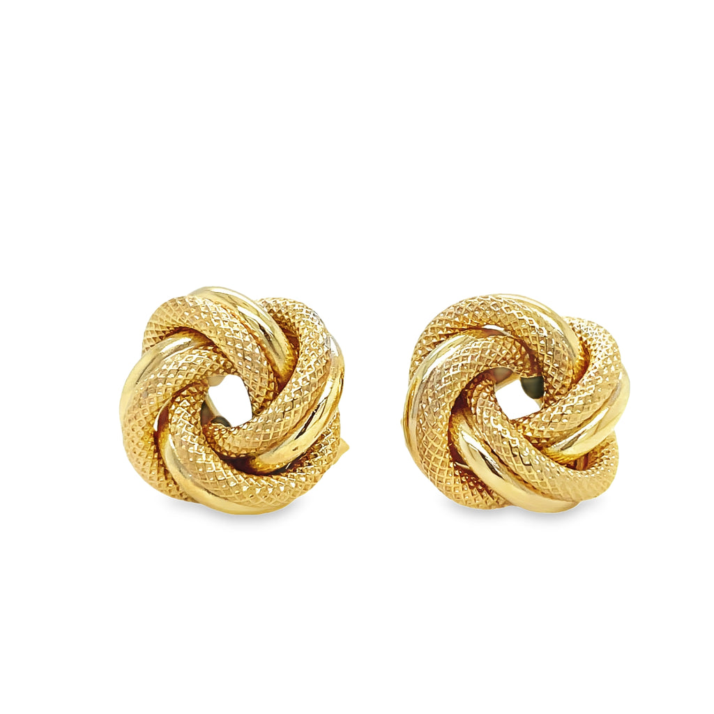 These beautiful 14k Italian yellow gold love knot stud earrings add a timeless and elegant touch to any wardrobe. Crafted from keep-forever materials, these 15.00 mm earrings will become a lifelong keepsake for you or someone special to enjoy. Adorn your ears with a gorgeous reminder of your love.