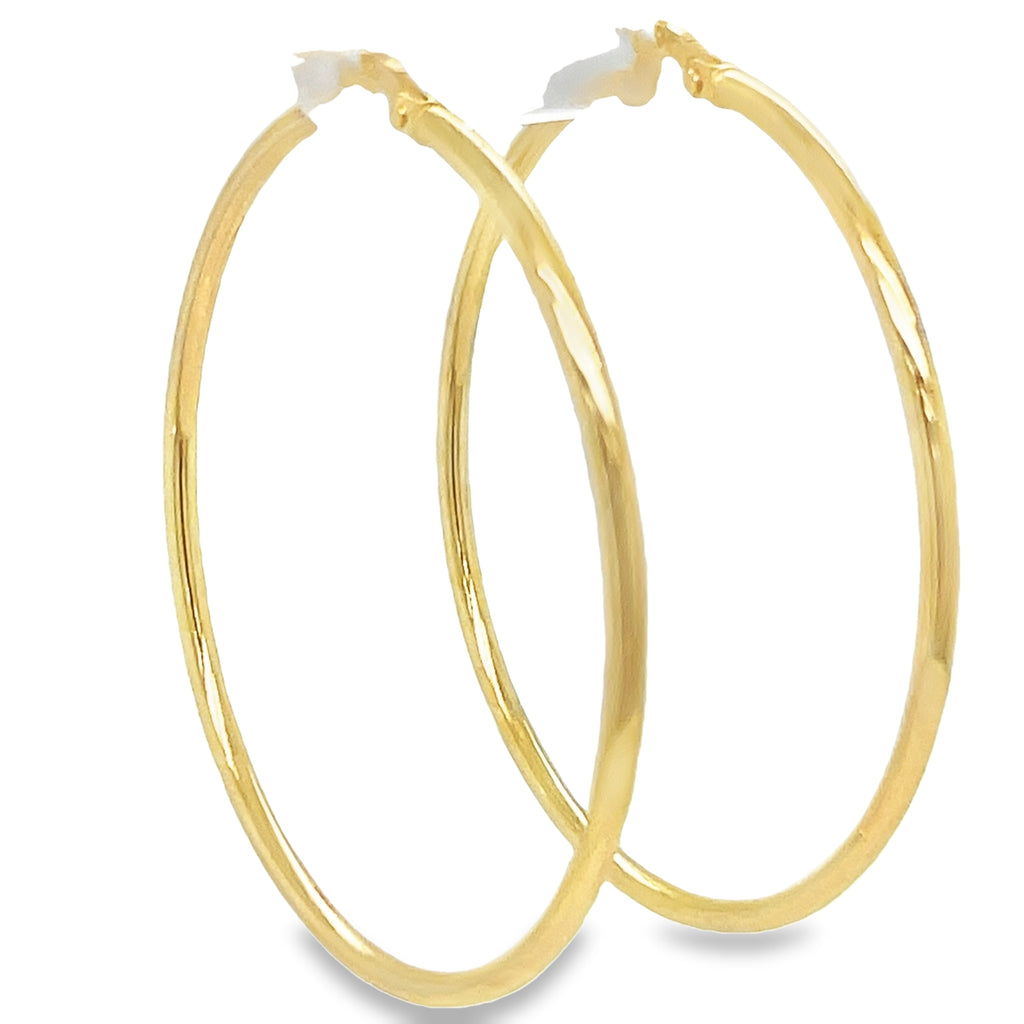 Experience elegance and style with our 14k Italian Yellow Gold Small Hoop Earrings! These beautiful earrings are crafted with 14k yellow gold and measure 1.80 mm thick. The secure lever system ensures they stay in place all day, making these 1-3/4" hoop earrings the perfect addition to any outfit. Elevate your look with these versatile and timeless earrings.