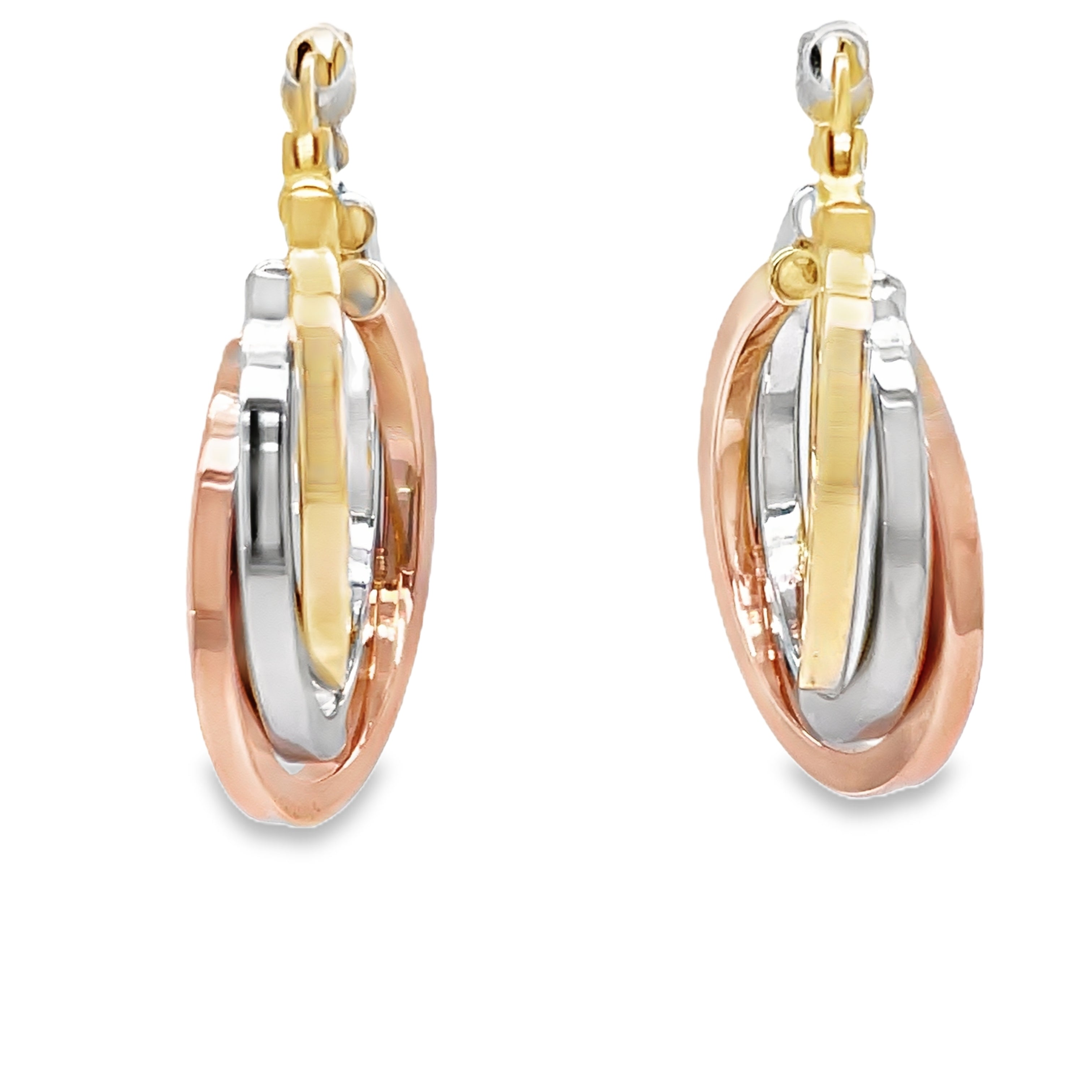 ndulge in luxury with our 14k Tricolor Graduated Style Hoop Earrings. Made with exquisite Italian gold, these 25 x 20mm earrings feature a hinged system for easy wear and a graduated style for a chic and sophisticated look. Elevate your style with these exclusive earrings.