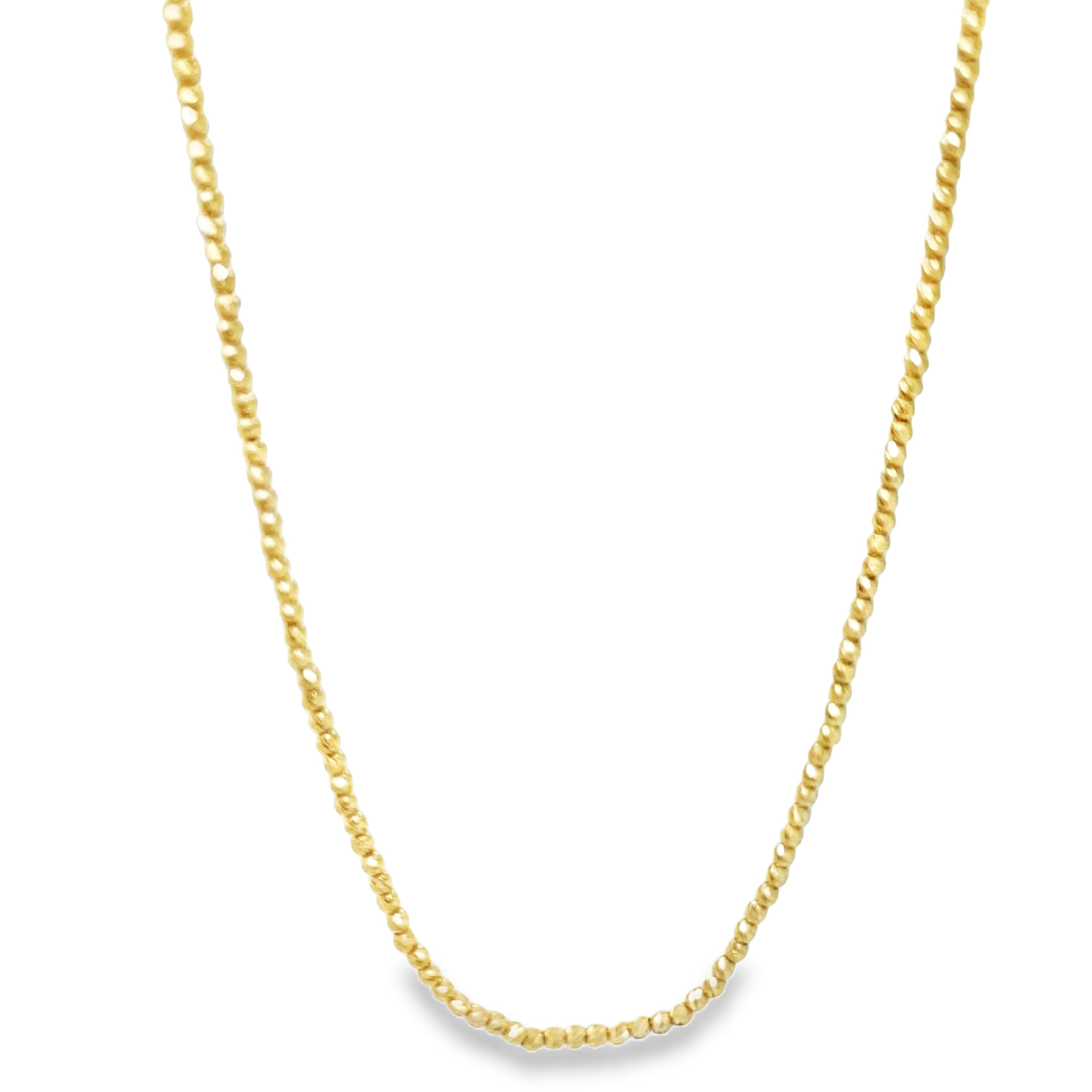 Indulge in luxury with our 14K Italian Yellow Gold Bead Chain Necklace. Handcrafted in Italy, this exquisite necklace features a diamond cut design for added brilliance. Measuring 16" long, with a 2" sizing loop and secure lobster clasp, it's the perfect addition to your collection. Elevate your style today.