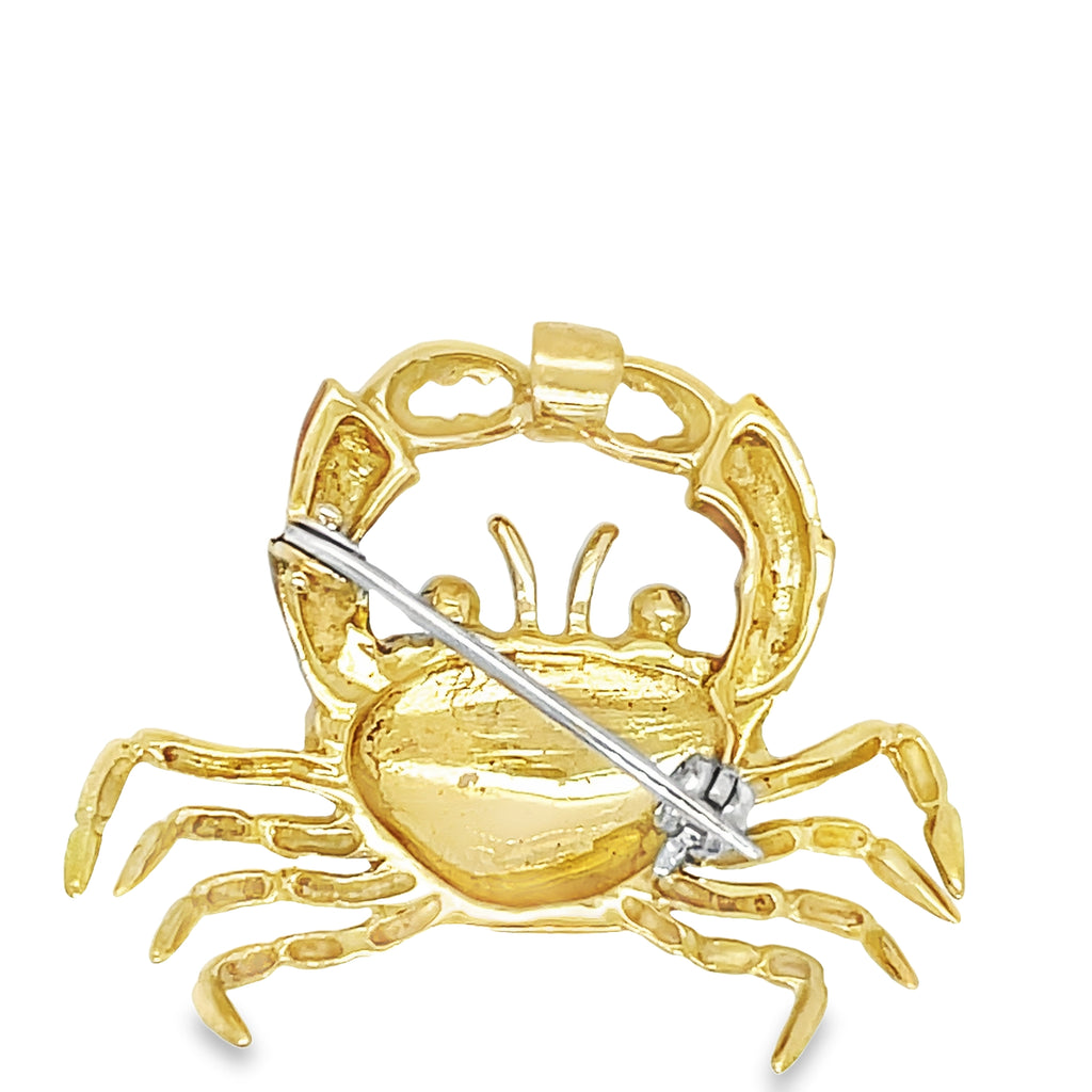 Add a touch of elegance to any outfit with our Italian Made Enamel & Diamond Crab Brooch! Handcrafted with 18k Italian yellow gold and a sparkling round diamond, this versatile piece can be worn as a brooch or pendant. With its beautiful hand-painted enamel colors, it's sure to catch the eye. Perfect for any occasion!"