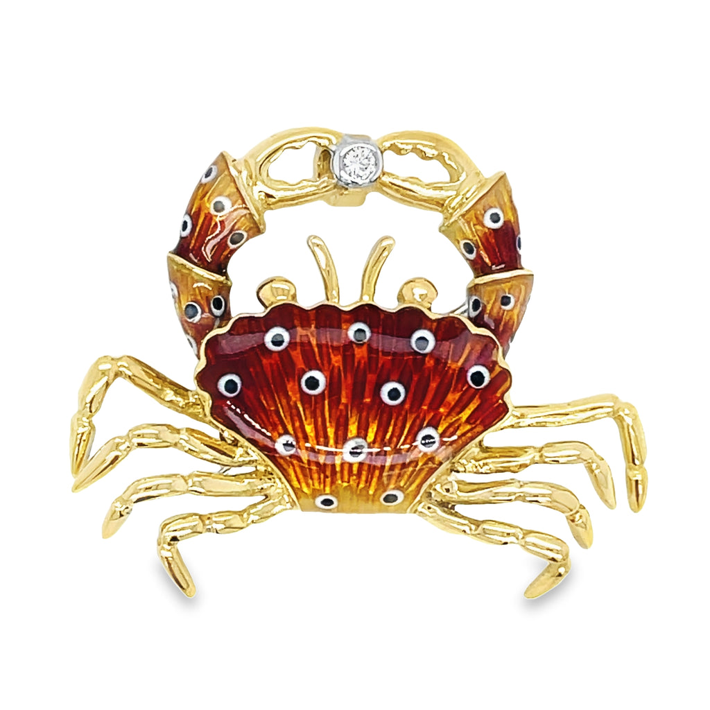 Add a touch of elegance to any outfit with our Italian Made Enamel & Diamond Crab Brooch! Handcrafted with 18k Italian yellow gold and a sparkling round diamond, this versatile piece can be worn as a brooch or pendant. With its beautiful hand-painted enamel colors, it's sure to catch the eye. Perfect for any occasion!"